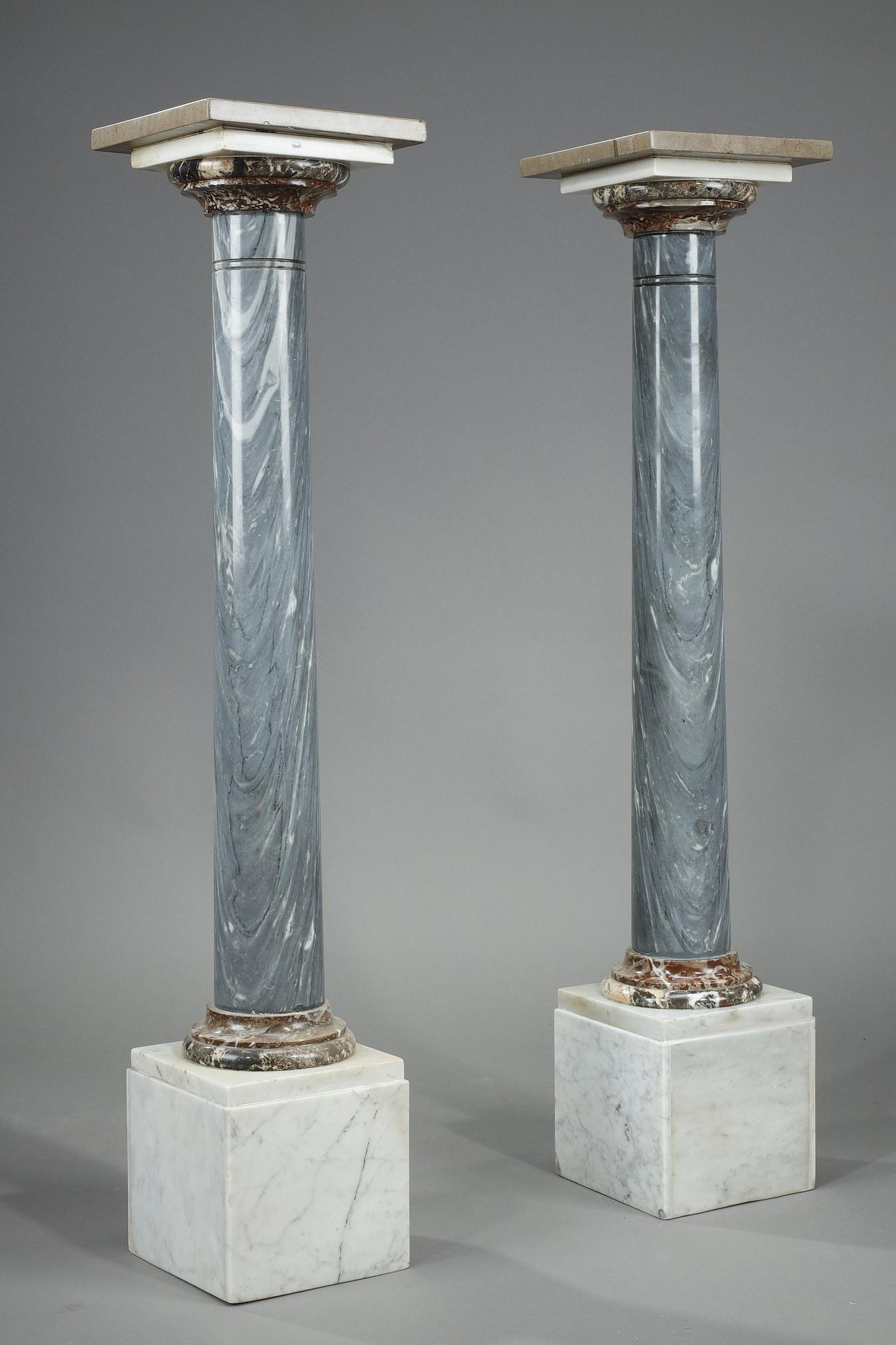Two Napoleon III period columns composed of a great variety of marbles in rare colors of blue and violet. The shaft in 
