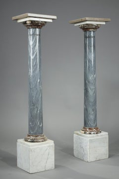 Pair of "Turquin Blue Marble" and "Arlequino Breccia" Columns