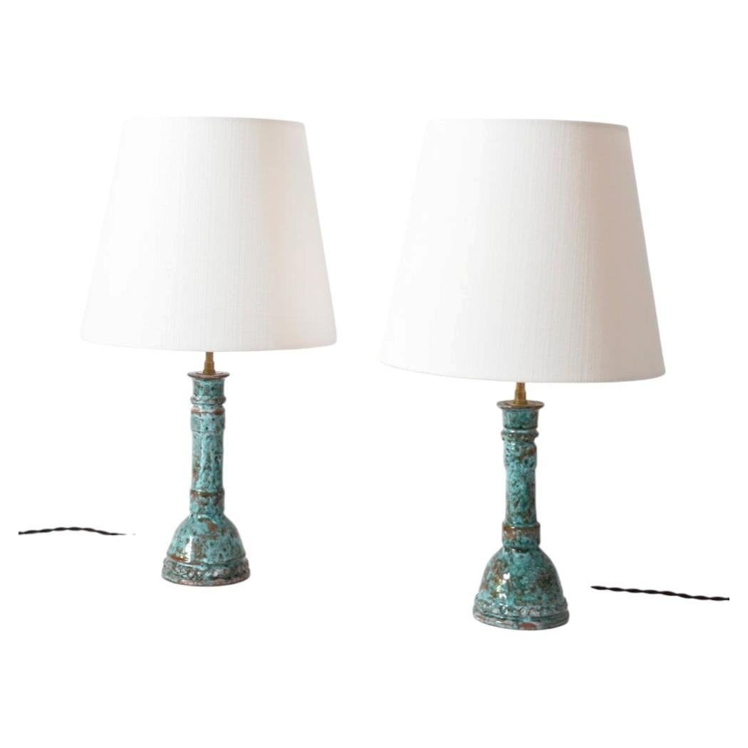 Paire de lampes turquoise et marron.