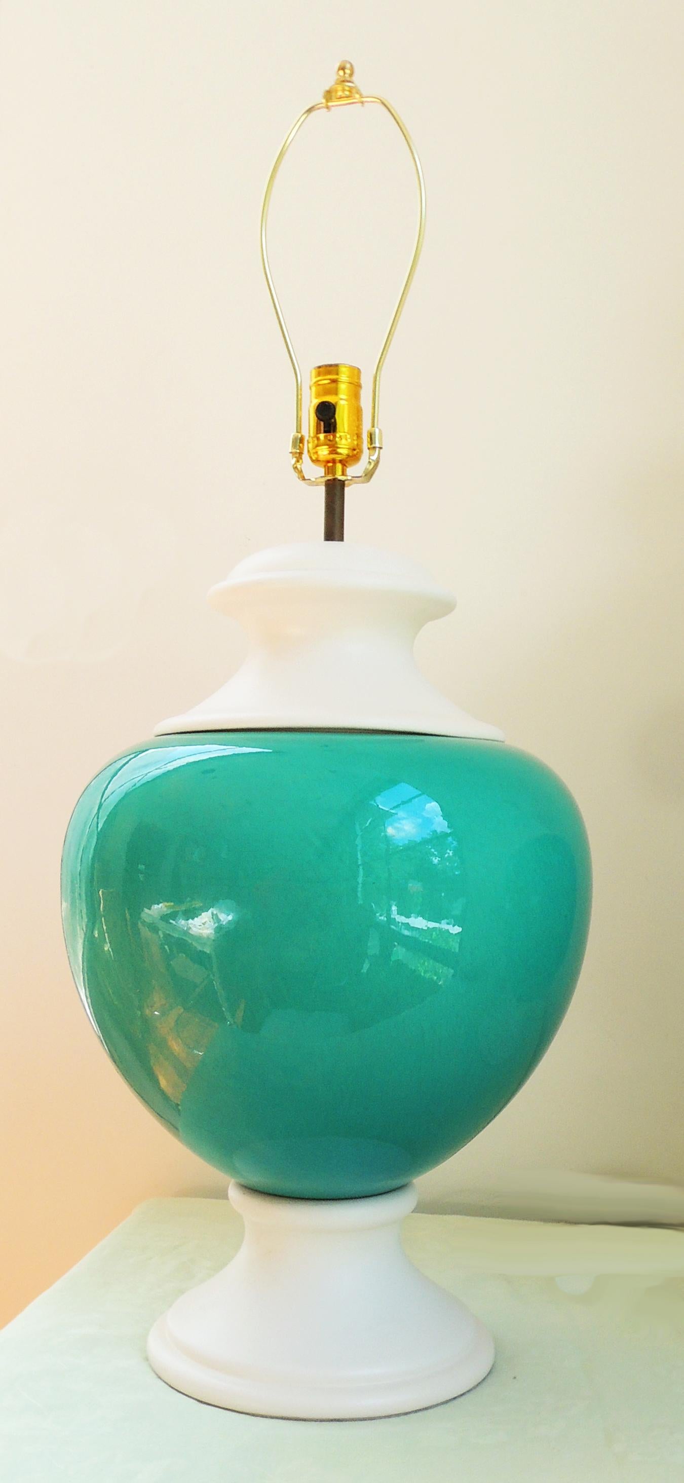 Pair of large table lamps. Turquoise element is ceramic. White elements are metal. Original wiring European. No marks, but guessing they are Italian!
Height of the lamp itself is 20