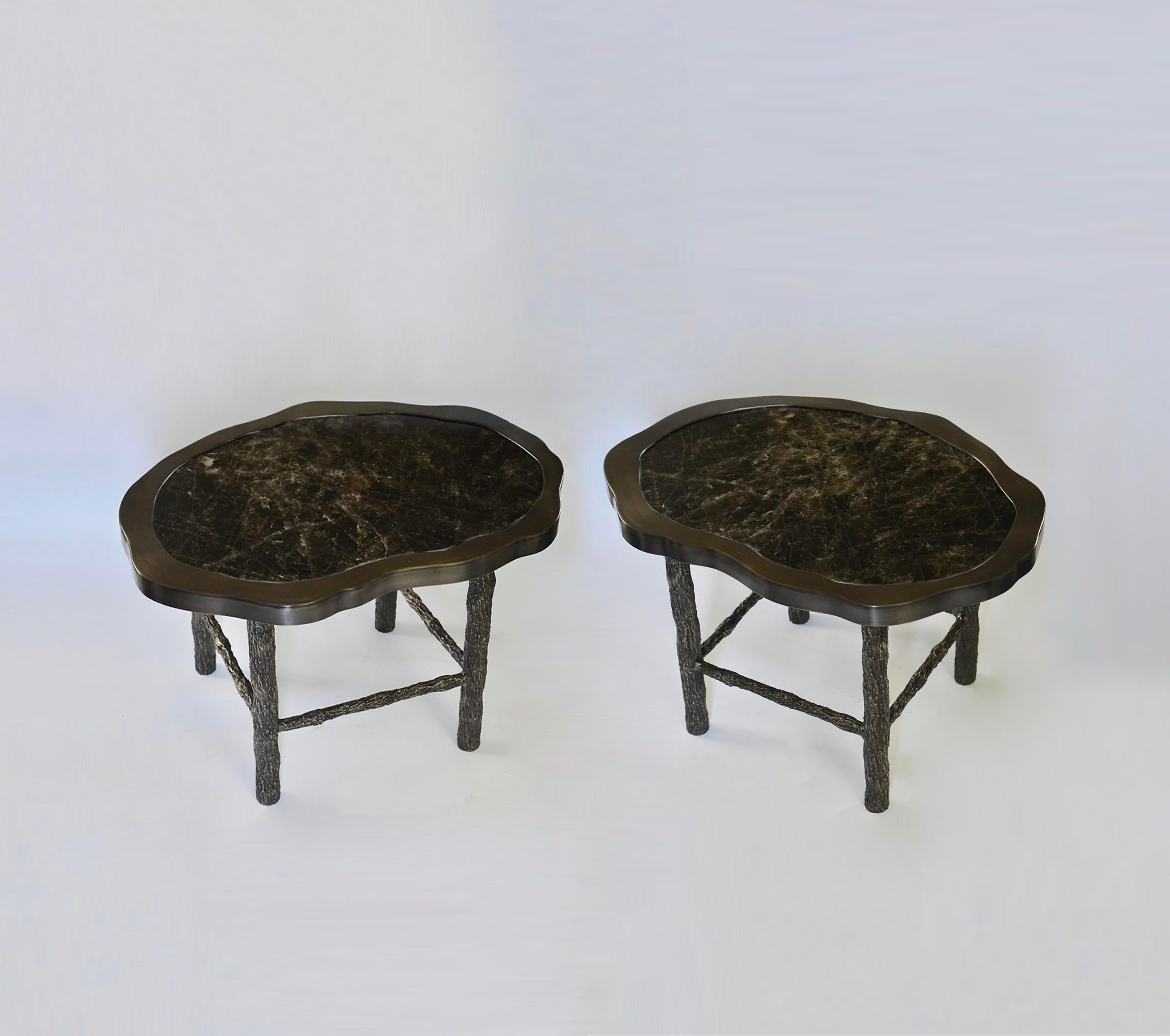 Pair of smoky dark rock crystal quartz cocktail tables with twig inspired antique brass legs, created by Phoenix Gallery.
Can be sold by separate.
Custom size upon request.
