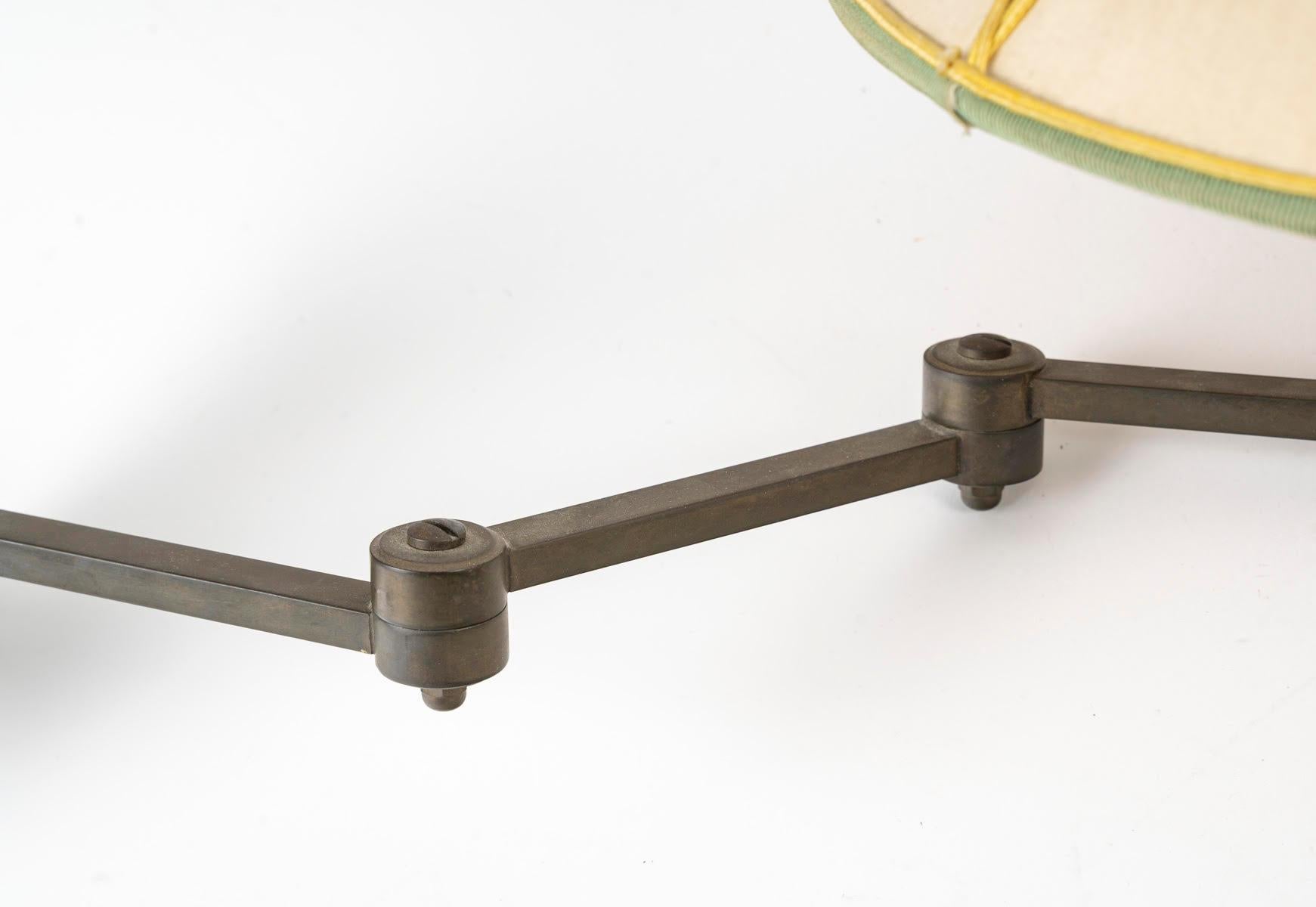 Patinated Pair of Twentieth Century Brass Folding Sconces and Bedside Lamps.