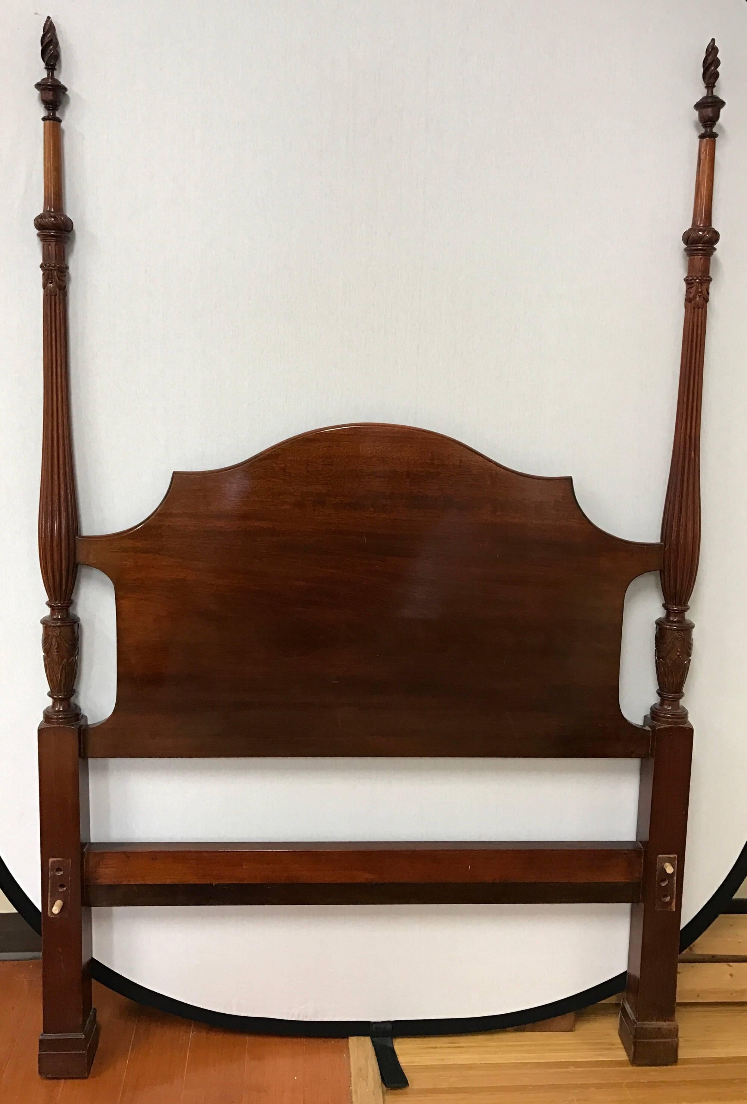 Pair of antique mahogany twin four-poster beds with carved detail and removable finials. Includes rails.