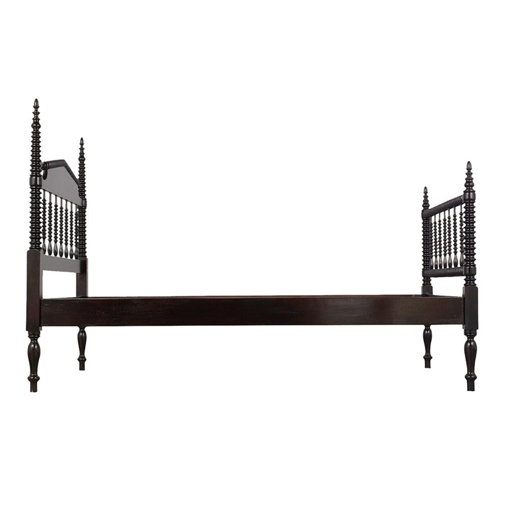 This pair of completely restored Regency style twin beds are made of mahogany wood and have a newly ebonized lacquered finish. The headboards and footboards feature twisted carved details. original wooden side and three wood slats for support. The