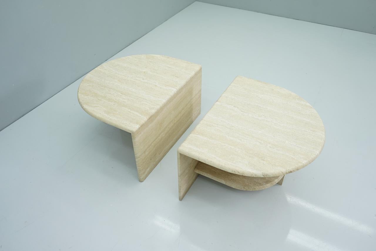 Small version of twin travertine coffee tables, 1970s. Can be used individually or together. 

Measurements per item: W 60 cm (23.6 in), D 75 cm (29.5 in), H 40.5 cm (15.9 in) 

Very good condition.
