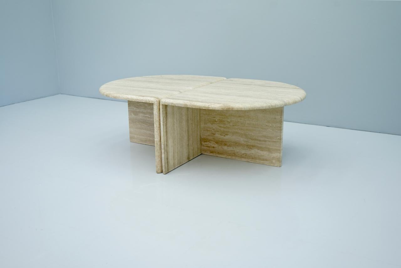Pair of twin travertine coffee tables, 1970s.
Can be used individually or together.
Measurements per item: W 70 cm, D 90.5 cm, H 45 cm.
Very good condition.