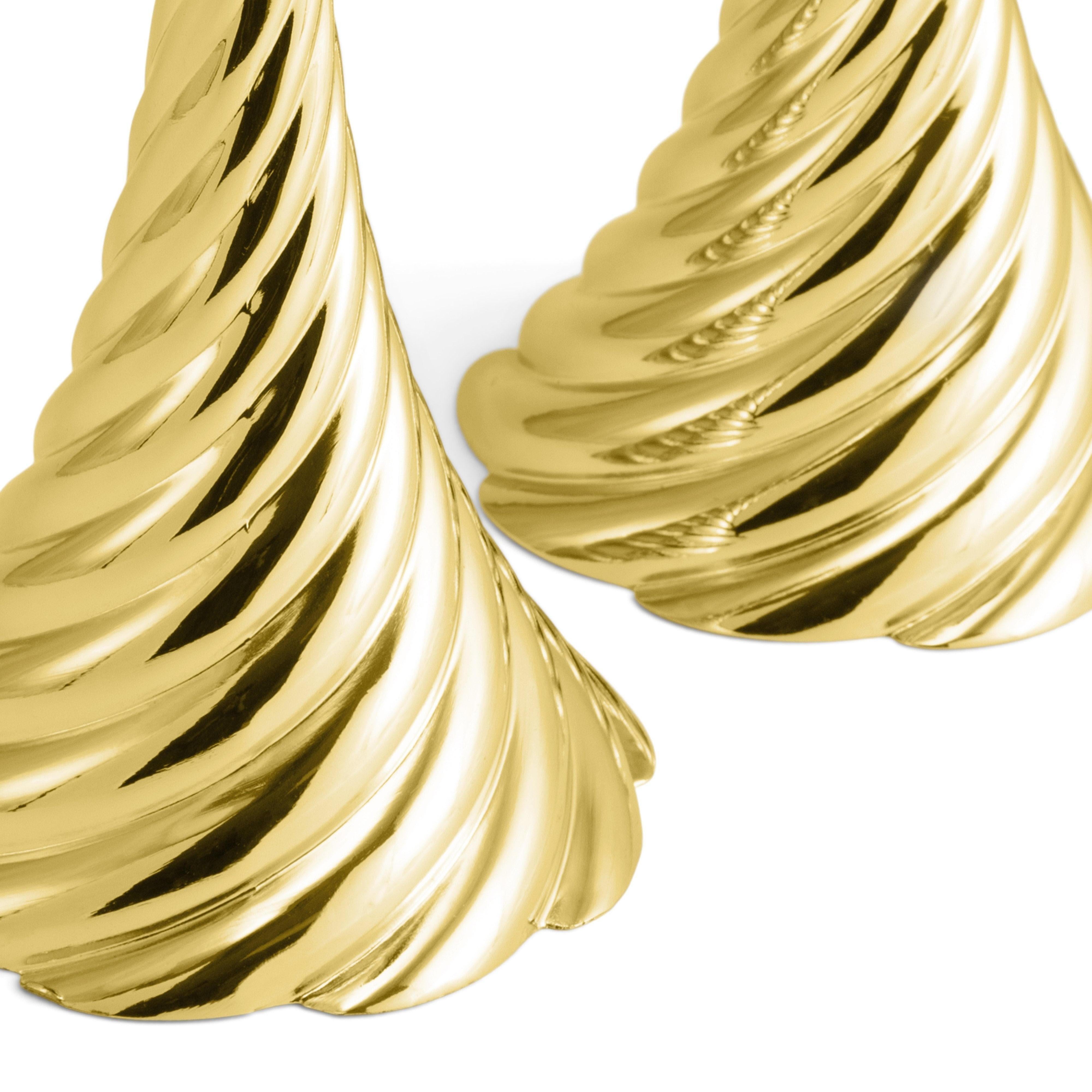Pair of Twist candlesticks, gilded metal, contemporary work.

A pair of Twist candle holders, crafted in gilded metal, with a modern, dynamic design. Each candleholder features an elegant spiral design, offering a curved base and visual interest.