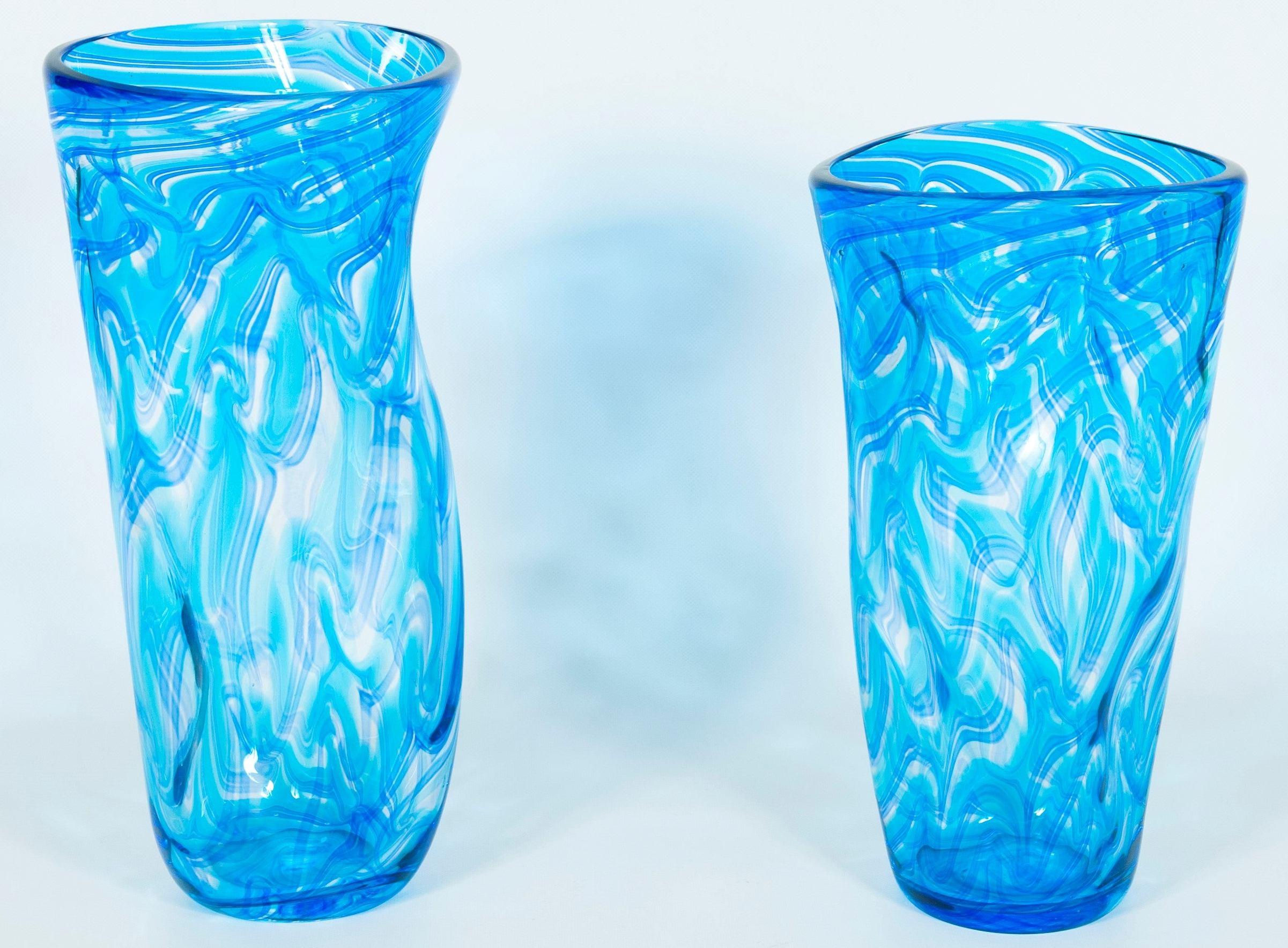 Pair of twisted vases in blown Murano glass blue color with waves pattern, Italy. Huge size, and majestic design, and Italian manufacture.
A fantastic couple of contemporary vases in blown Murano glass handcrafted in the island of Murano, Venice,