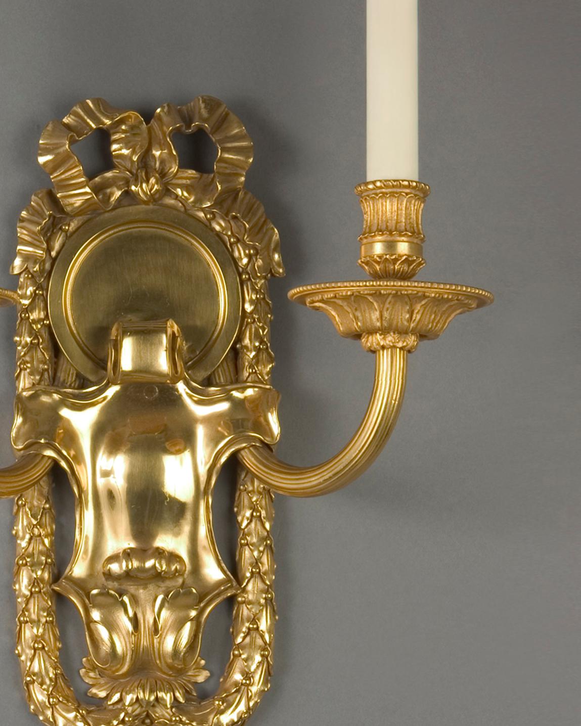 Baroque Pair of Two Arm Gilded Bronze and Copper Sconces by the E. F. Caldwell Co. 1910s For Sale