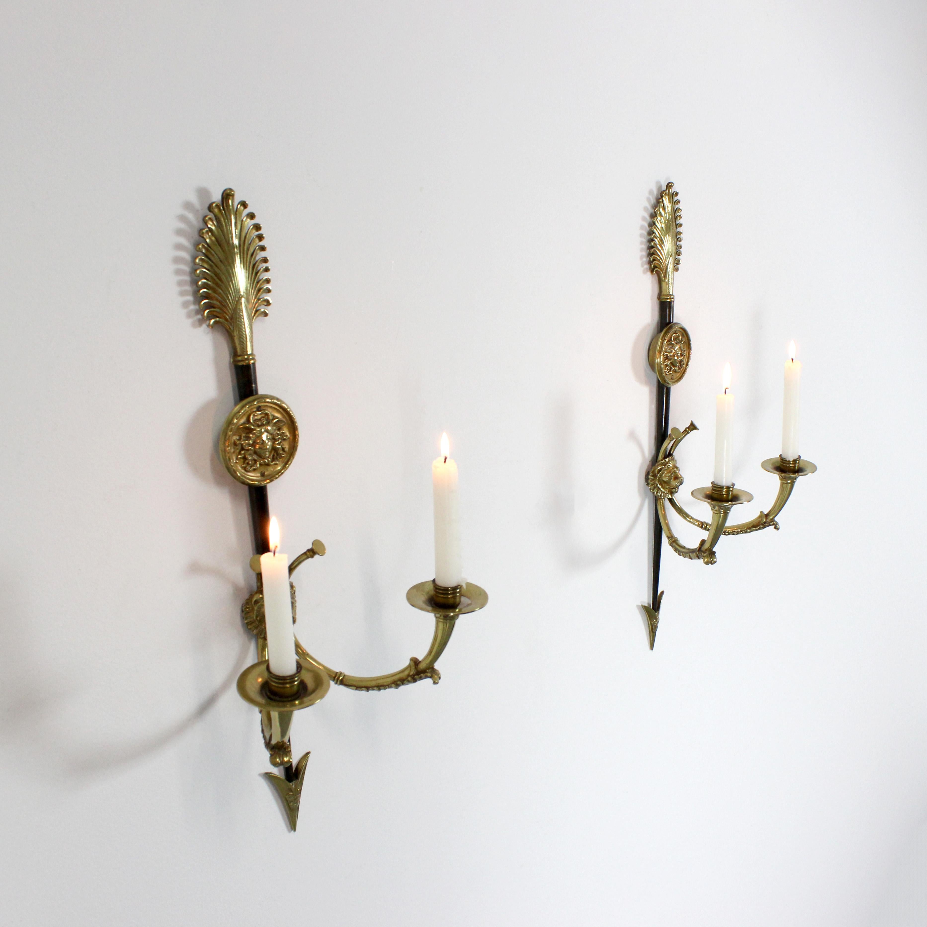 Brass Pair of two-armed bronze candelabras. France For Sale