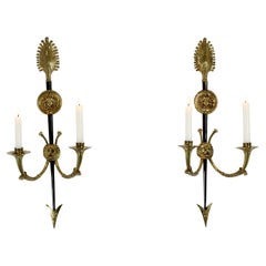 Pair of two-armed bronze candelabras. France
