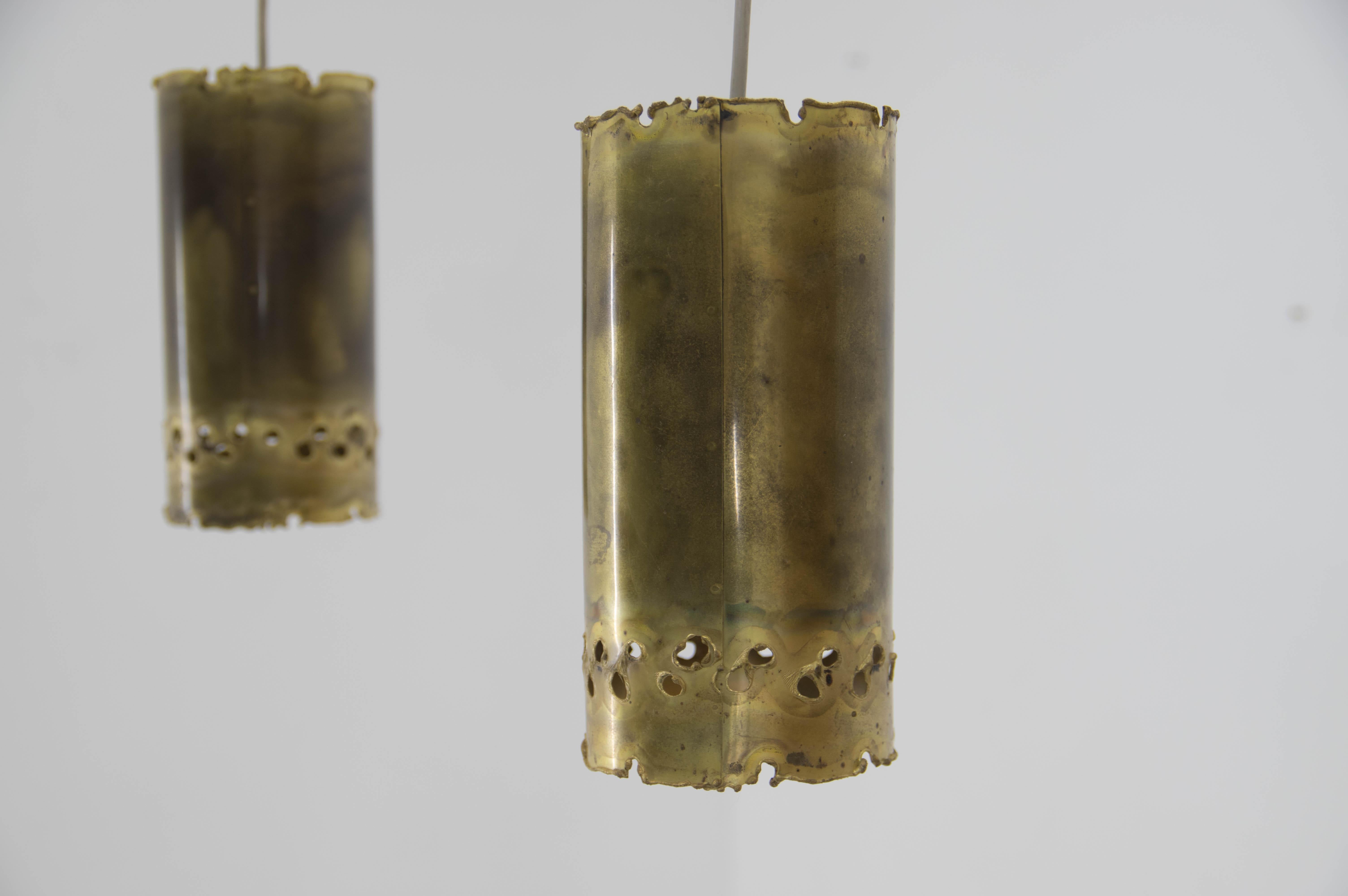 A pair of Brutalist acid treated and torch-cut pendants was designed by Svend Aage Holm Sørensen in the early 1960s. Manufactured by Holm Sørensen in Denmark. Perfect original condition.
1x60W, E25-E27 bulb
US wiring compatible.