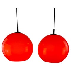 Vintage Pair of two cherry red glass Peill & Putzler pendant lights, 1960