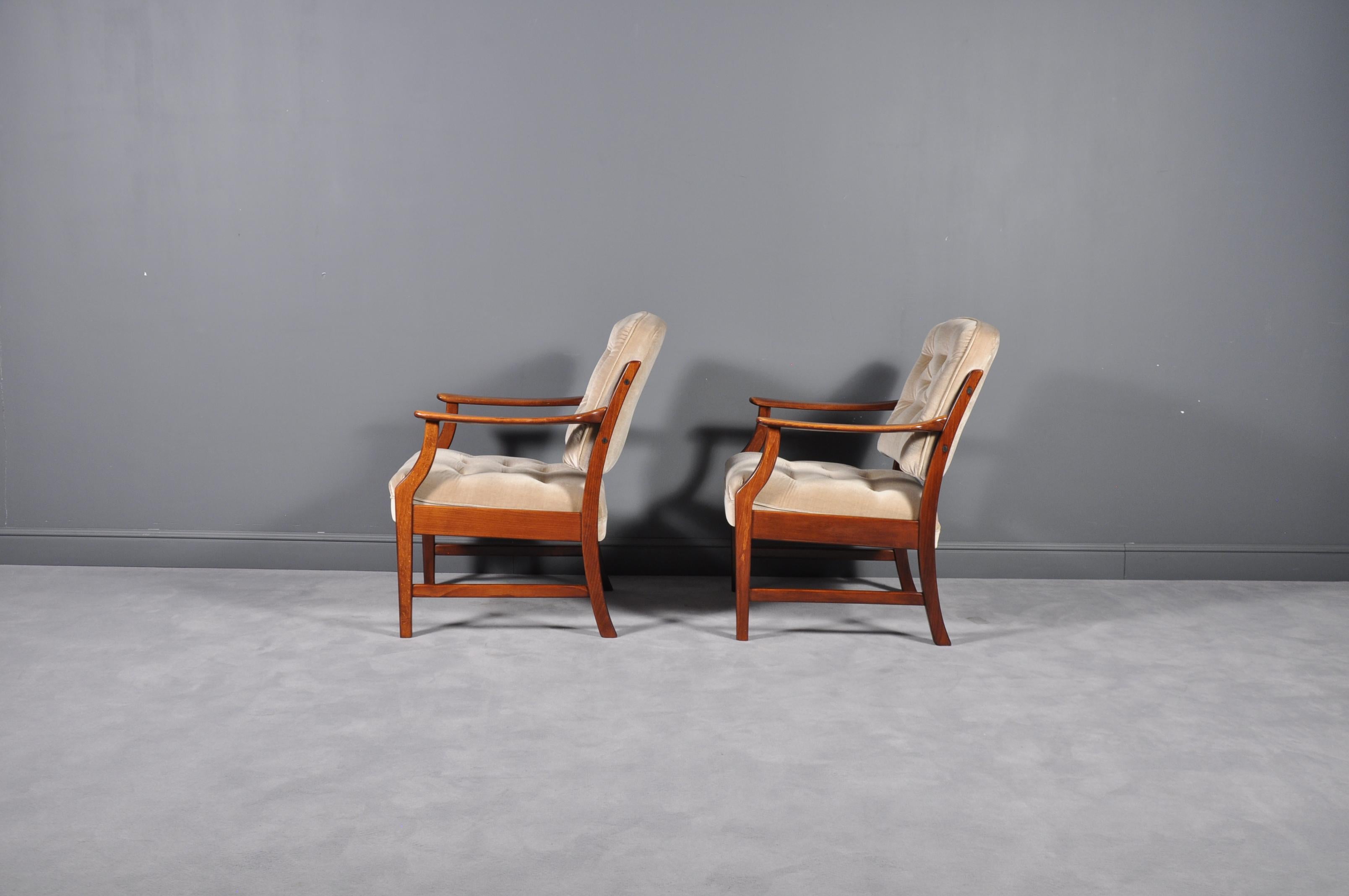 Pair of very clean original upholstery teak Danish Mid-Century Modern arm dining chairs.