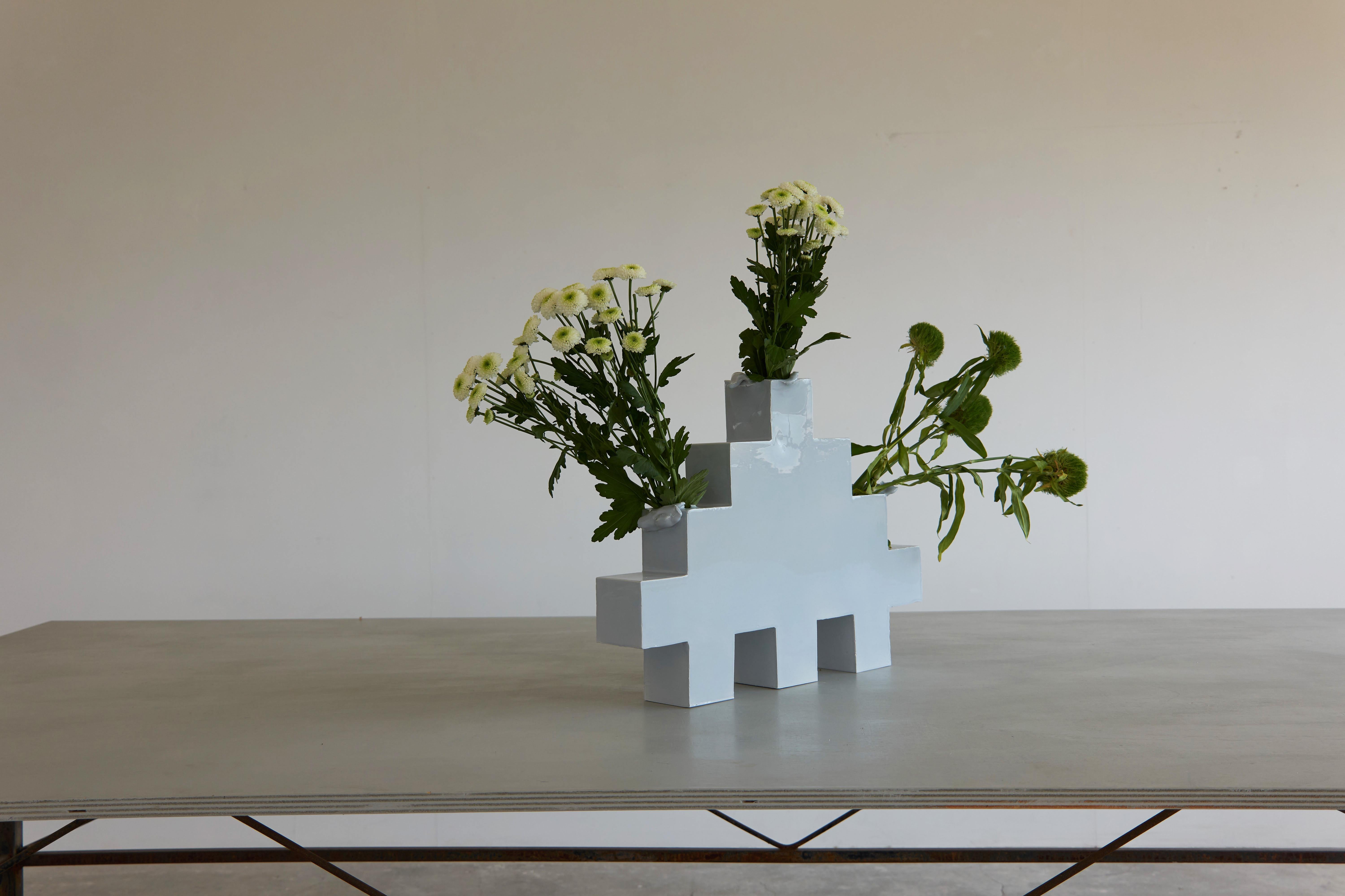 A pair of two Brick #3 bases -- part of a larger project titled Brick Block, Tick Tock which explores themes of silence, reconstruction, and gender equality, urging viewers to reflect on the systemic silencing of women and the transformative
