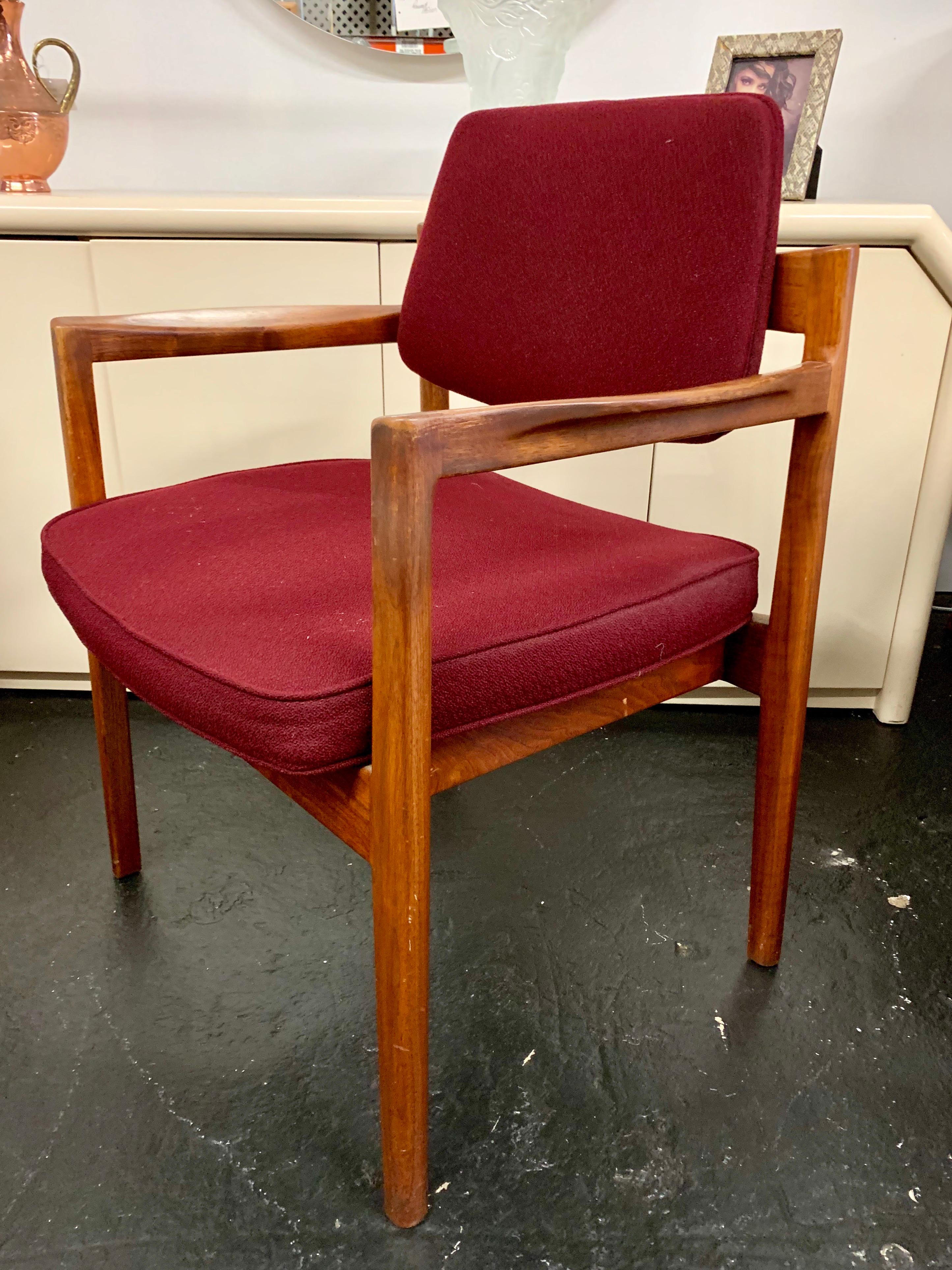 From the now closed Avon corporate building in Stamford, Connecticut, these matching armchairs
work great in a dining room, office or as accent chairs. The deep burgundy upholstery is original and still in very good condition. The walnut wood