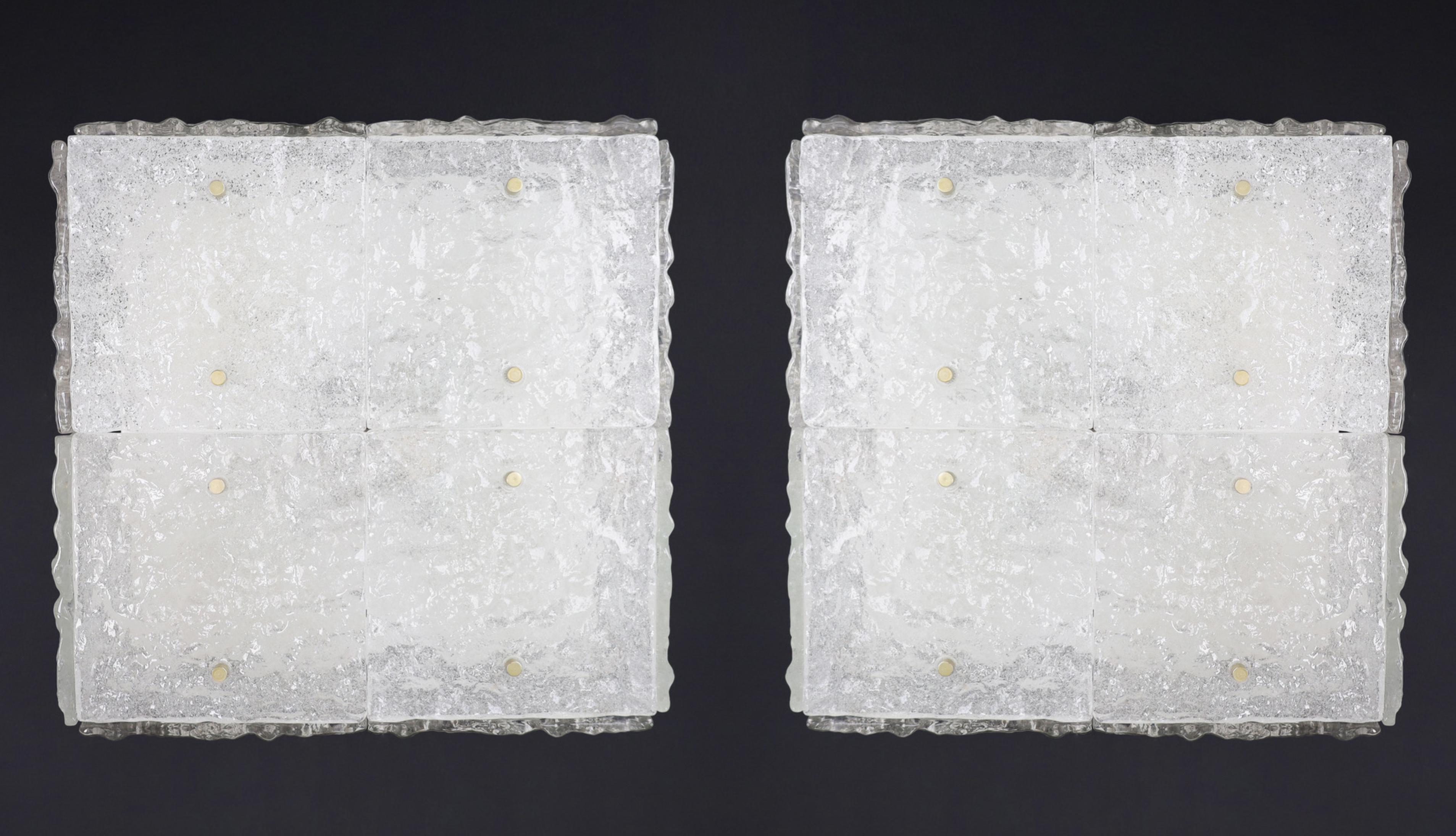 Pair of two Large Kalmar Ice Glass Flush-Mount or Wall lights, Austria 1960s

This is a beautiful set of two large ceiling lamps or wall lights made by Kalmar in Austria during the 1960s. These lights comprise 12 thick textured ice glass pieces