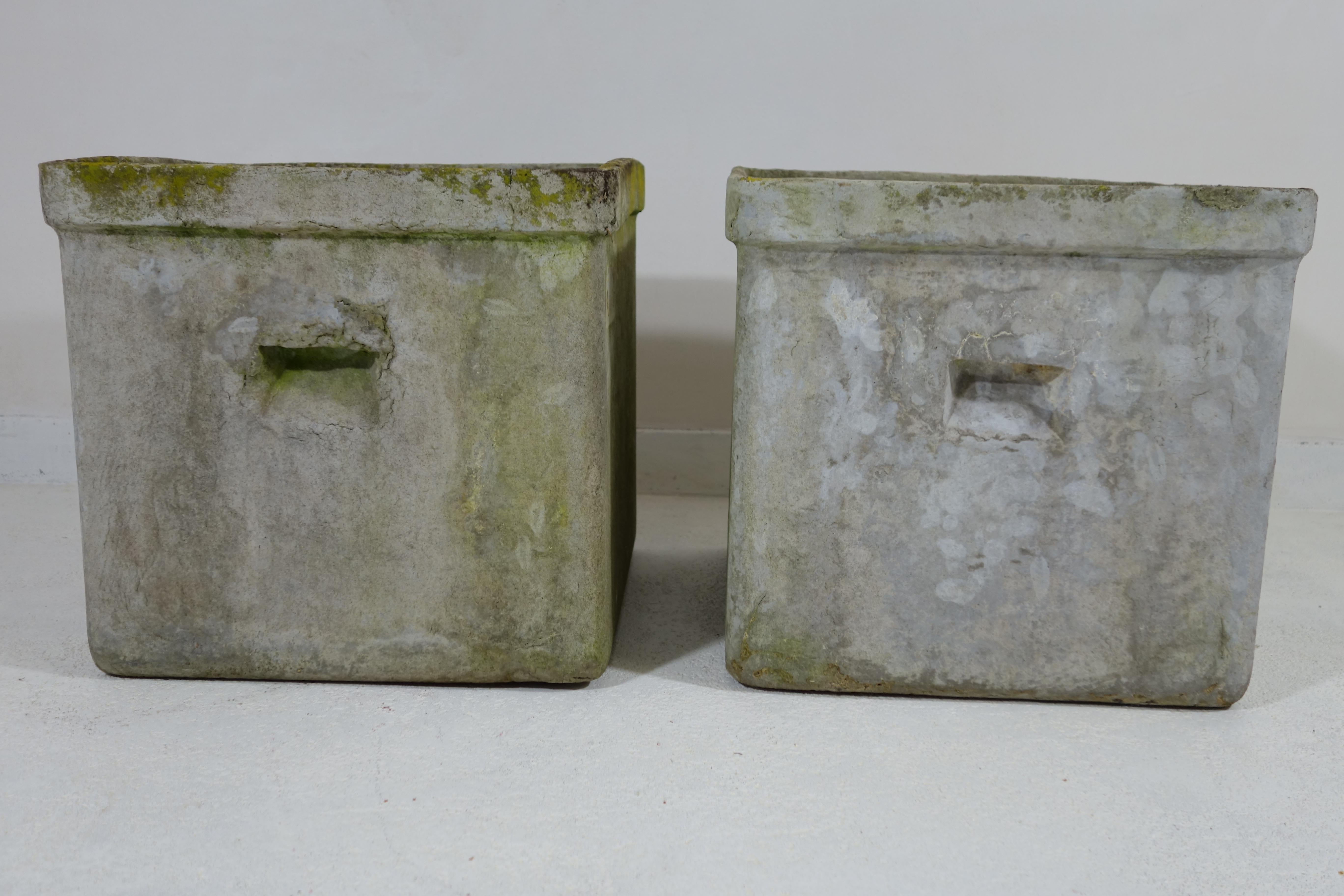 Pair of big rectangular planters by Swiss architect Willy Guhl for Eternit. 
The planter or jardinieres are made up of moulded cement. 
Good vintage condition with nice patina.