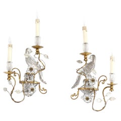 Pair of two-light wall lights with parrot motifs in gilt iron and glass