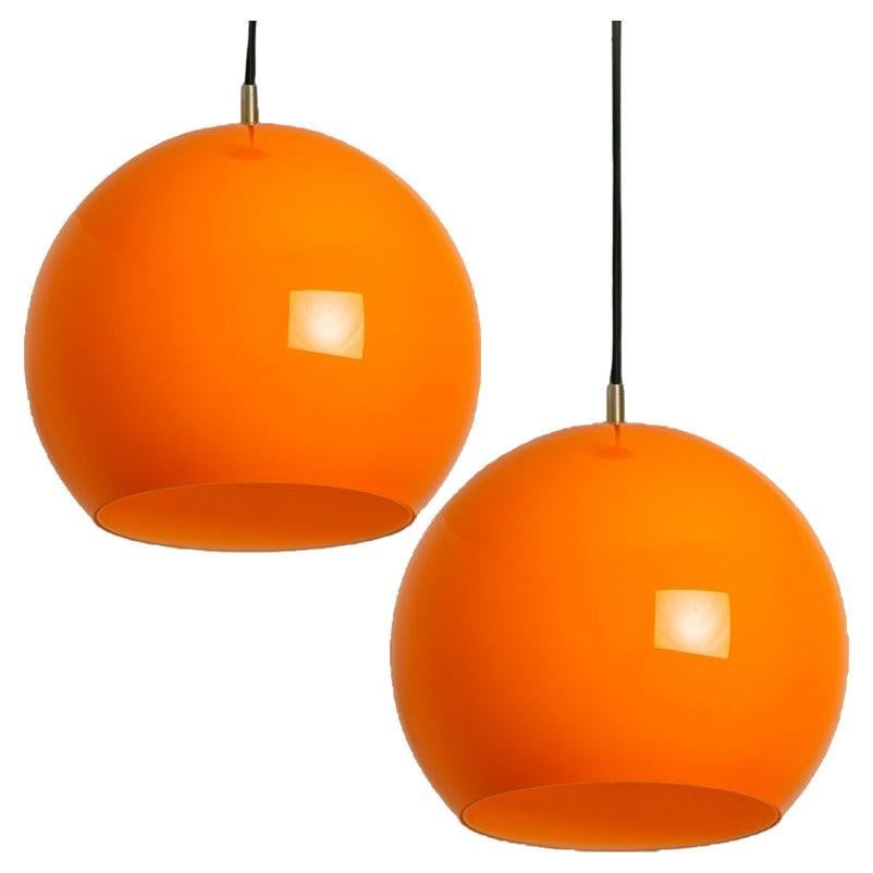 Pair of Two Orange Blown Peill Putzler Pendant Lights, 1970s For Sale