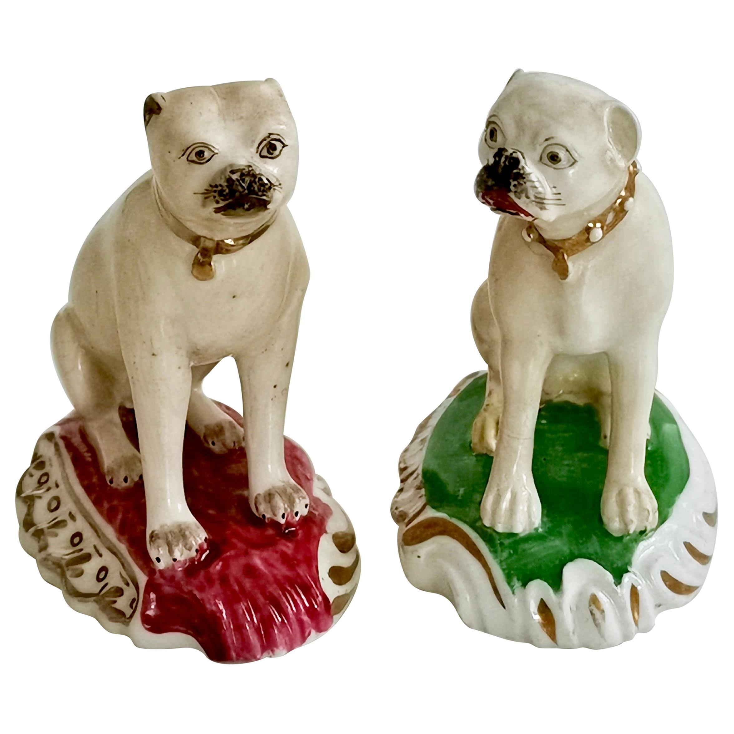 Pair of Two Rockingham Porcelain Pug Dog figures, Regency circa 1835
