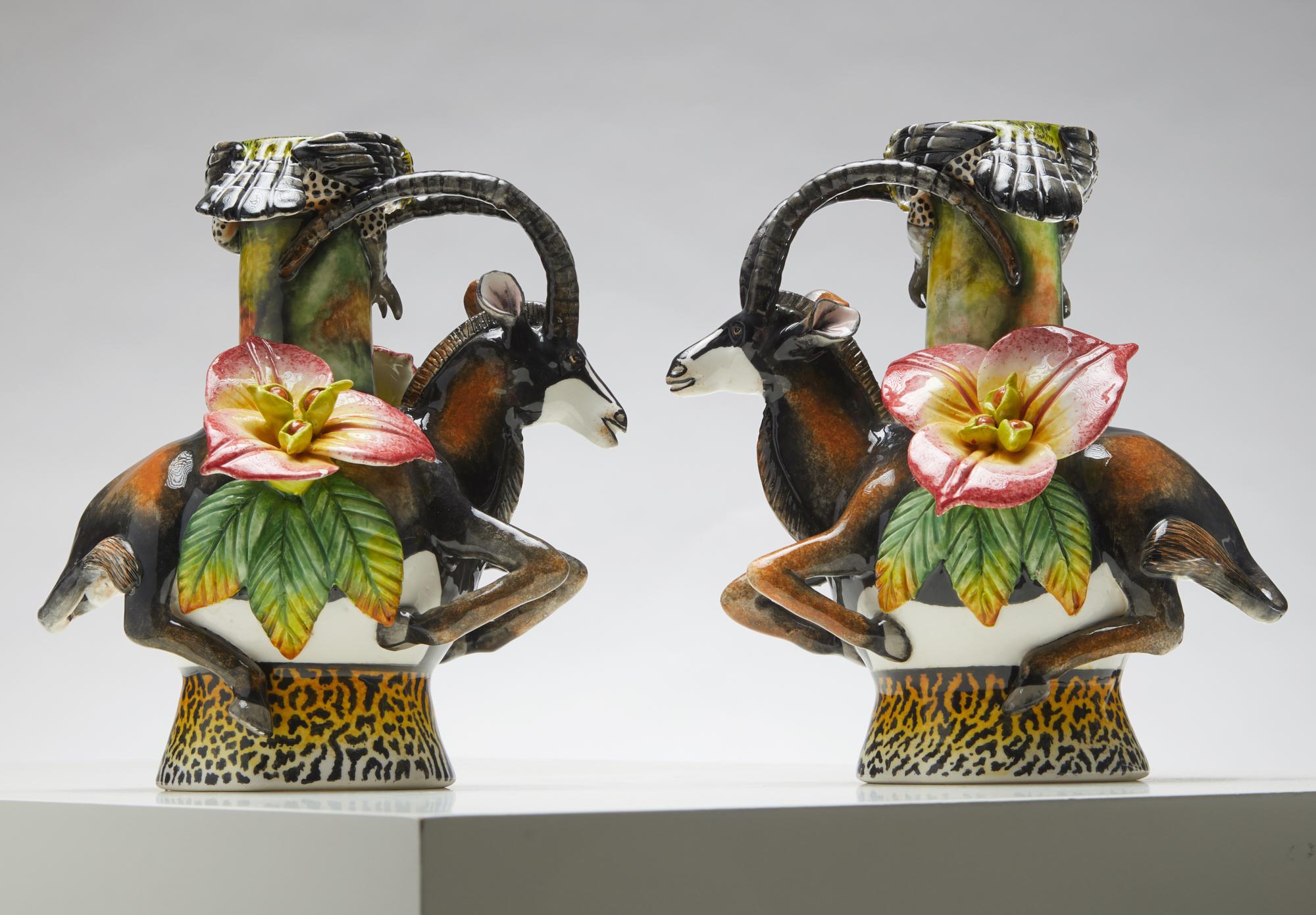 Introducing an exquisite pair of Sable Antelope sculpted candlesticks, a striking addition to any sophisticated decor. These beautifully crafted pieces capture the majestic elegance of the Sable Antelope, with intricate detailing and a stunningly