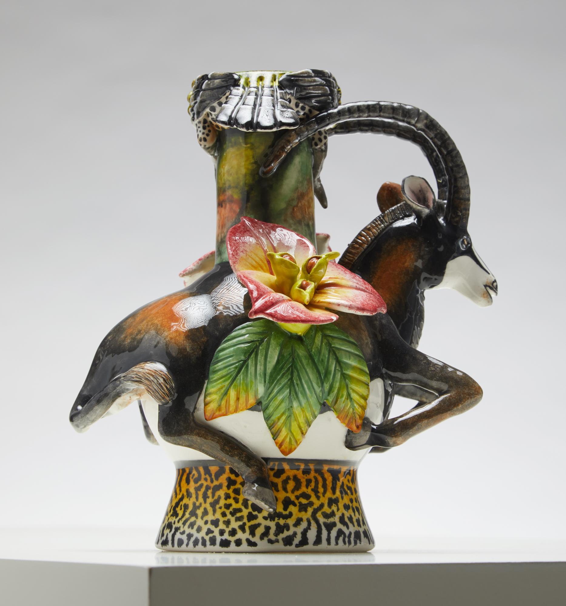 South African Pair of Two sculpted Sable Candleticks For Sale