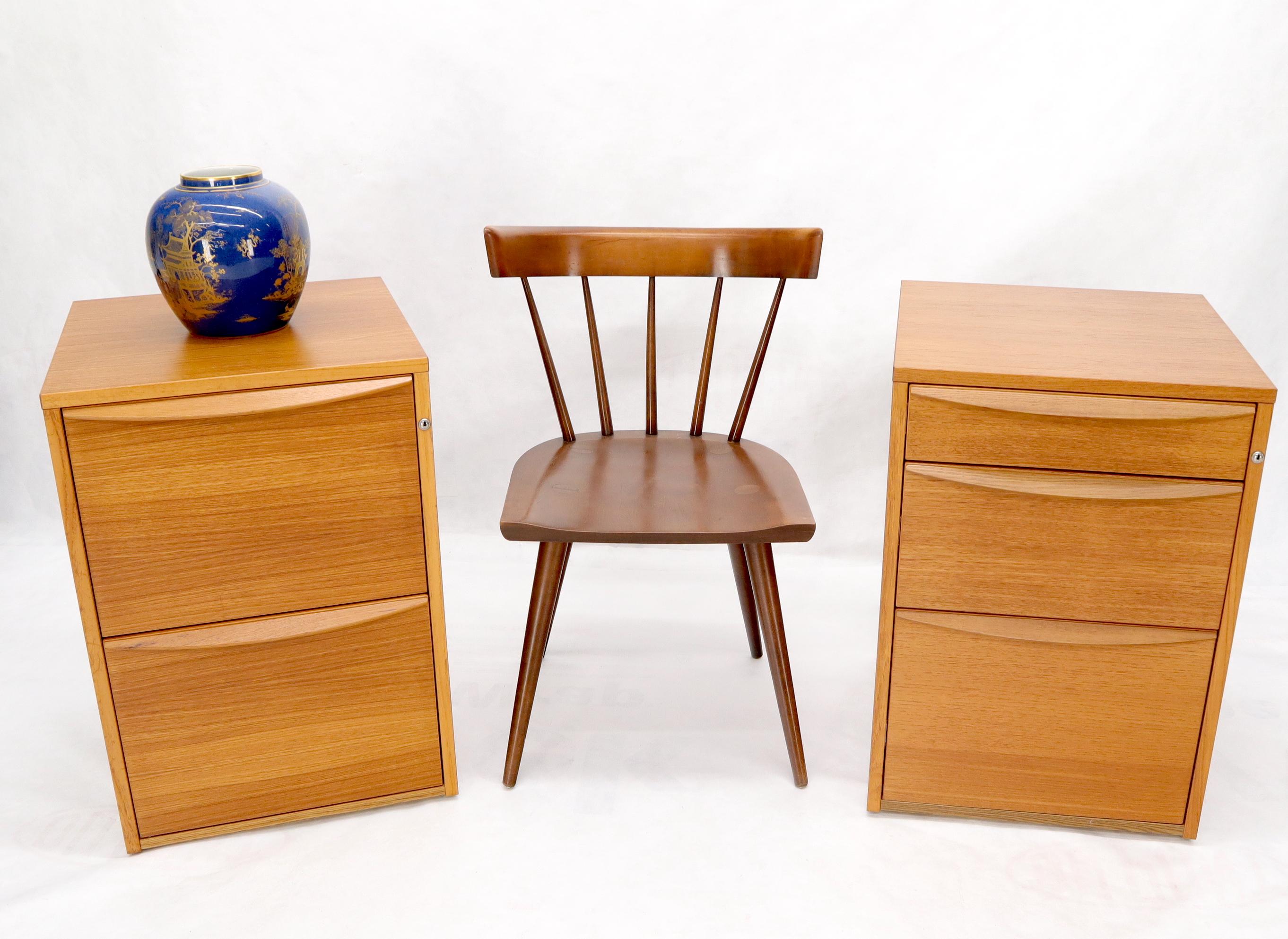 Pair of high grade teak file cabinets pedestals. With a right glass top for a desk of your own configuration. They are just perfect for making a glass top double pedestal writing console table or desk. Can be easily moves around with the built in