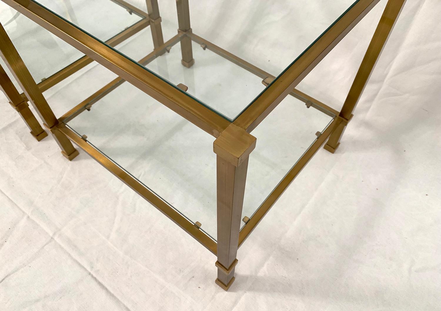 Mid-Century Modern Pair of Two-Tier Brass and Glass End Tables For Sale