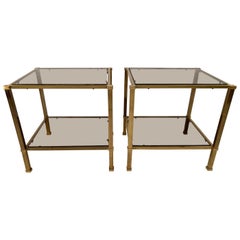 Pair of Two-Tier Brass and Smoked Glass End Tables Pair of Two-Tier Brass and Smoked Glass End Tables