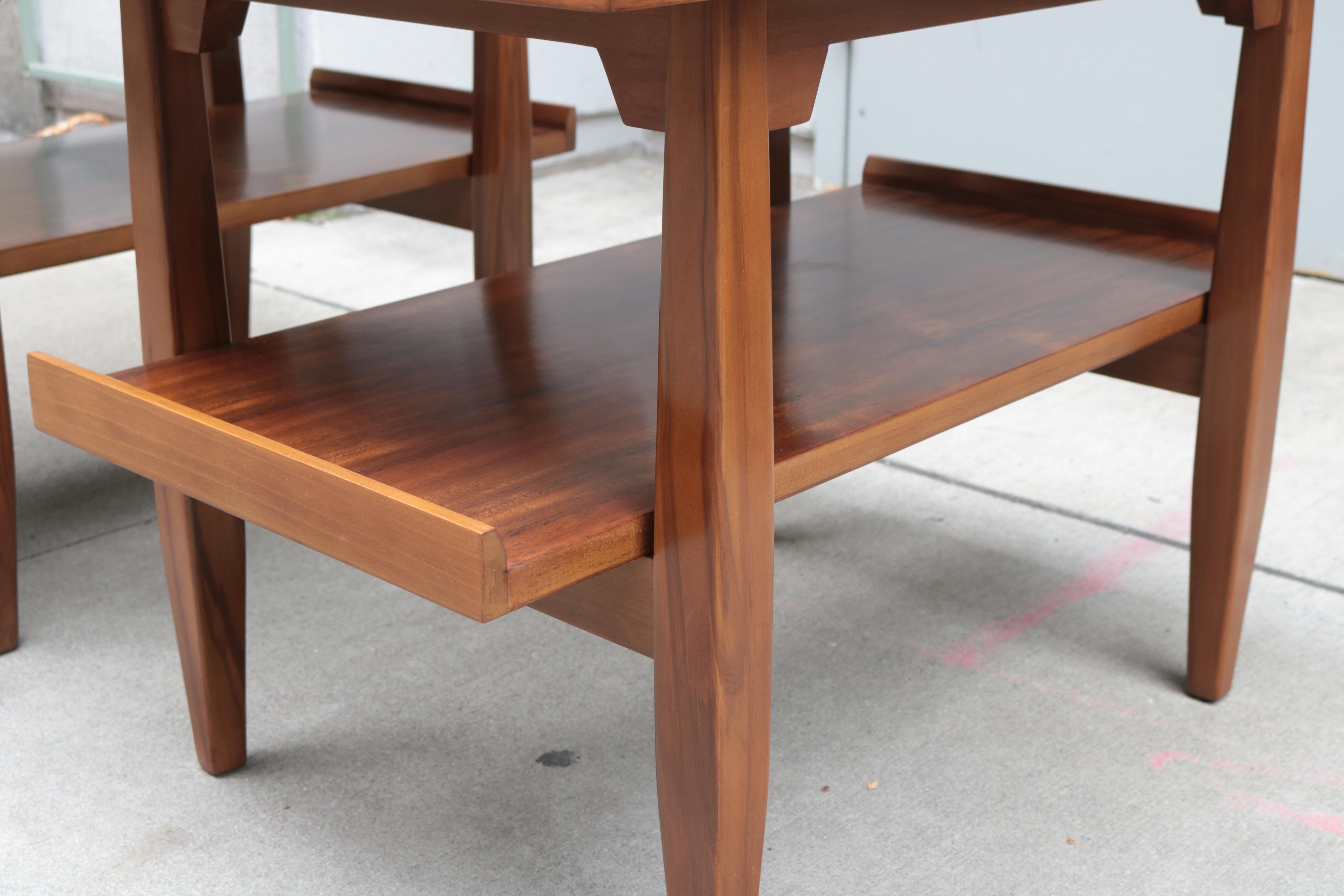 Pair of modernist two-tier cork top side tables. 
Walnut and cork.