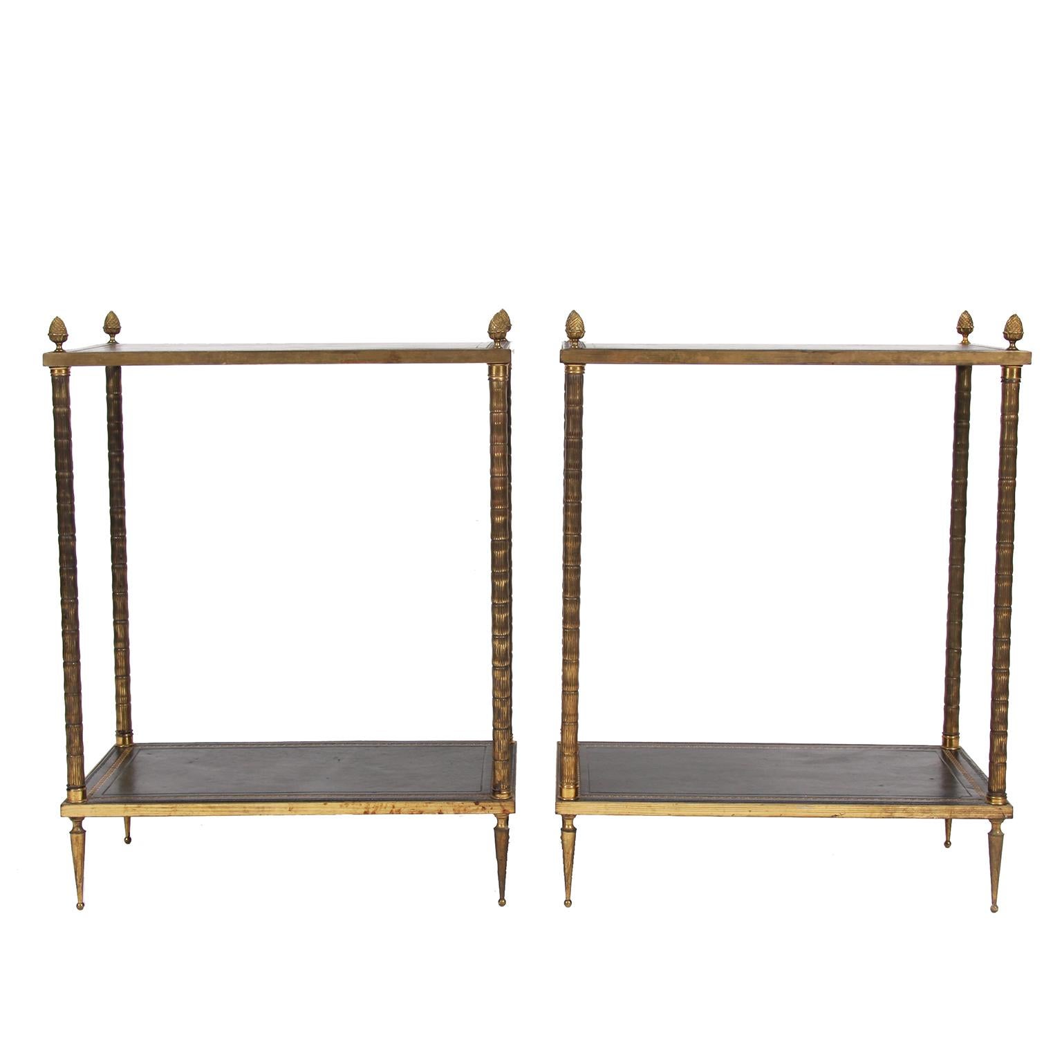 French, 1960s

A super quality pair of two-tier, leather top, side tables. With brass faux bamboo legs. 

Attributed to Bagues. 

With Greek key design on the leather. Lovely casting with pineapple finials. 

Excellent quality, rare and