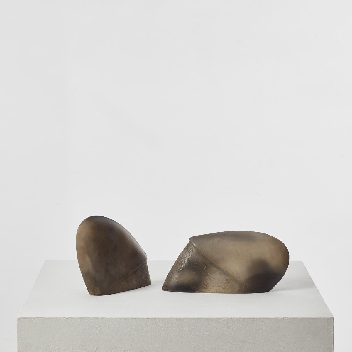 A grouping of two abstract sculptures with gently rhythmic, biomorphic forms, previously owned by Sir Terence Conran (1931 - 2020). Conran, an inimitable design pioneer and businessman, “did more than anyone to enhance material life in Britain