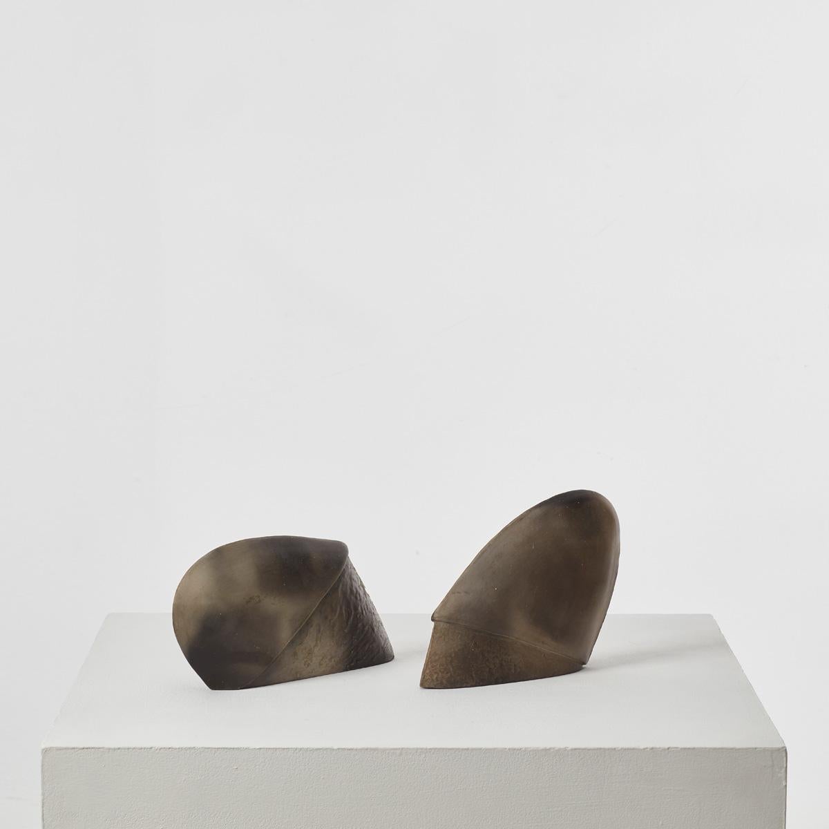 A grouping of two abstract sculptures with gently rhythmic, biomorphic forms, previously owned by Sir Terence Conran (1931 – 2020). Conran, an inimitable design pioneer and businessman, “did more than anyone to enhance material life in Britain