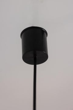 Pair of two-tone yellow and white glass pendant lights. 1960s