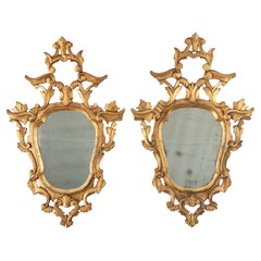 Coppia di due specchi rococò veneziani in legno dorato, 1850 circa Italia