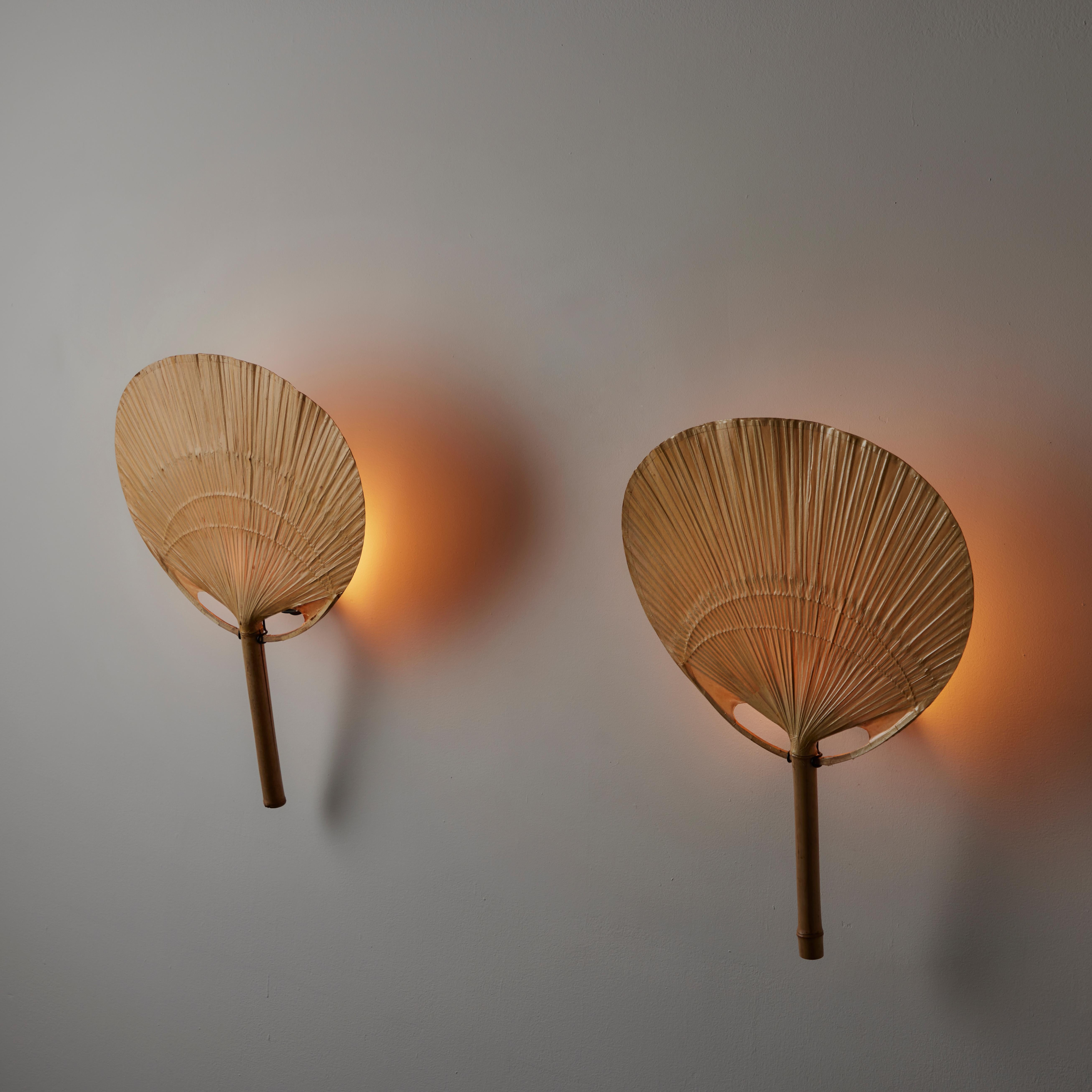 Pair of Uchiwa Sconces by Ingo Maurer. Designed and manufactured in Germany, circa 1970s. Bamboo, rice paper. Rewired for U.S. Standards. Each light takes one E27 40w maximum bulb. Bulbs provided as a one time courtesy. Sold as a pair only. 