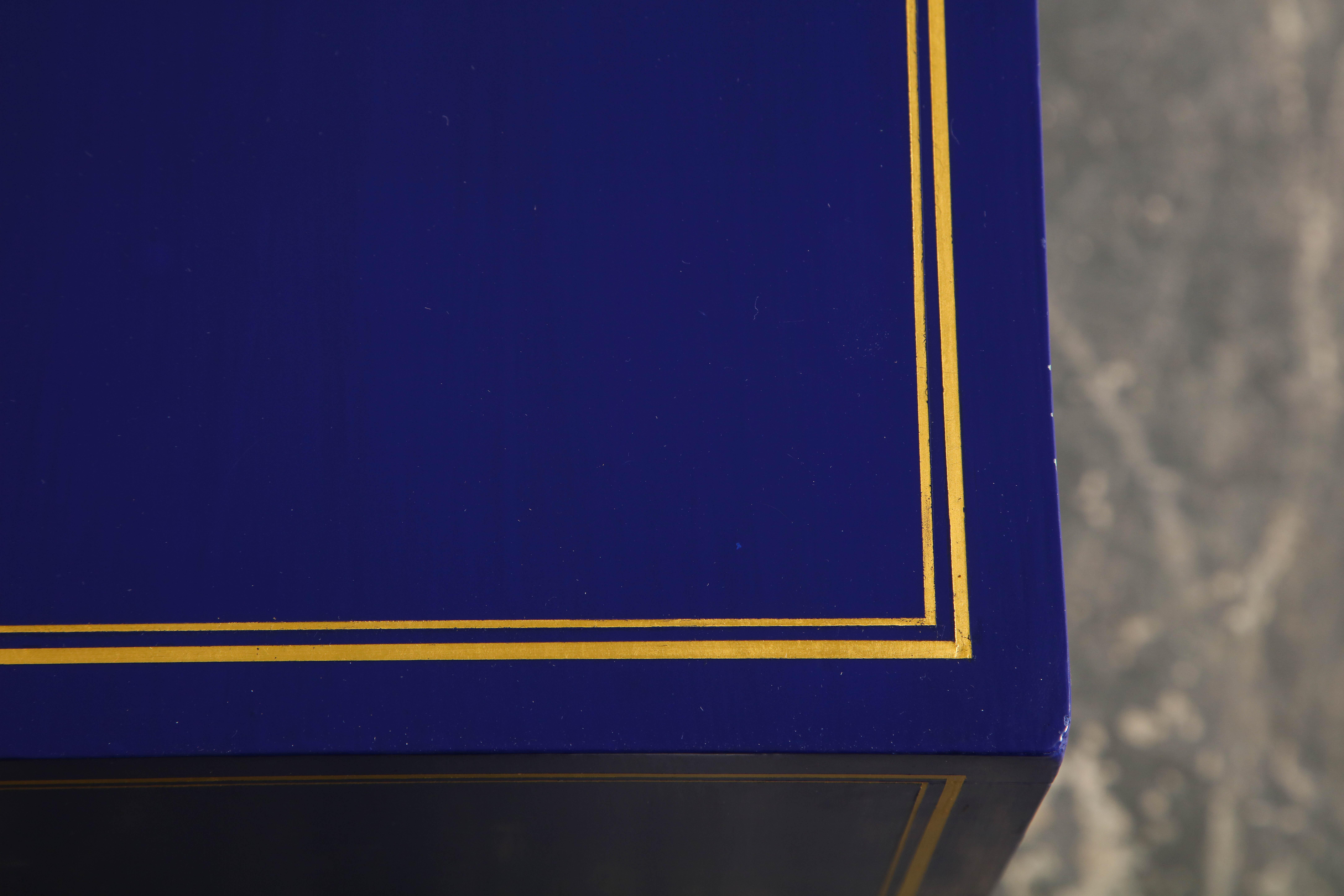 Pair of Ultramarine Blue and Gilt Side Cabinets 1