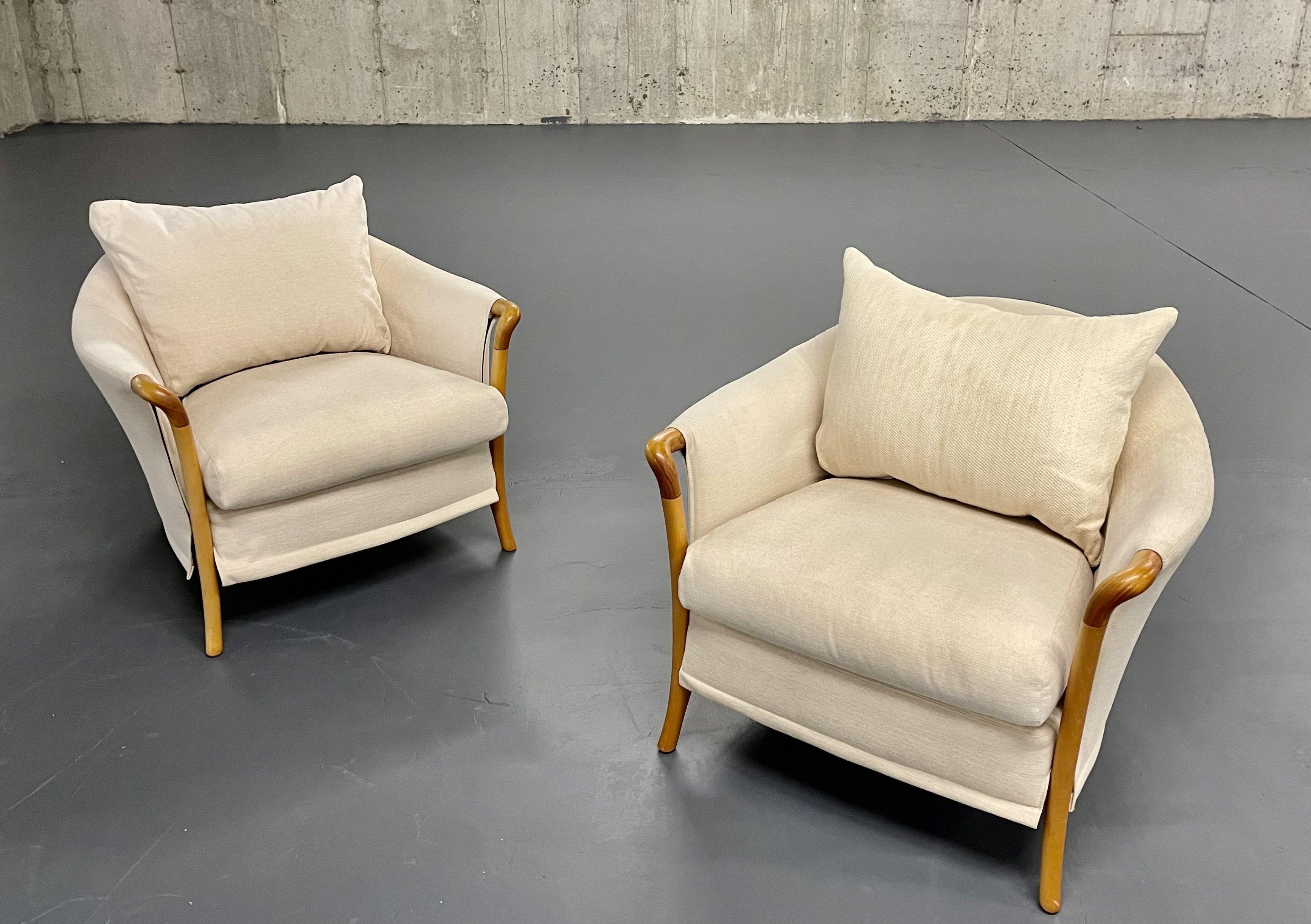 Pair of 'Progetti' Easy Chairs by Umberto Asnago for Giorgetti, Italy
 
Upholstered Chairs, having exposed wood arms. A stunning finely conditioned pair of Arm or Bergere Chairs. Steam cleaned.

Umberto Asagno started working for Giorgetti in 1968,