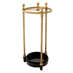 Pair of Umbrella Stands with a Patinated Brass Finish and Black Drip Tray.