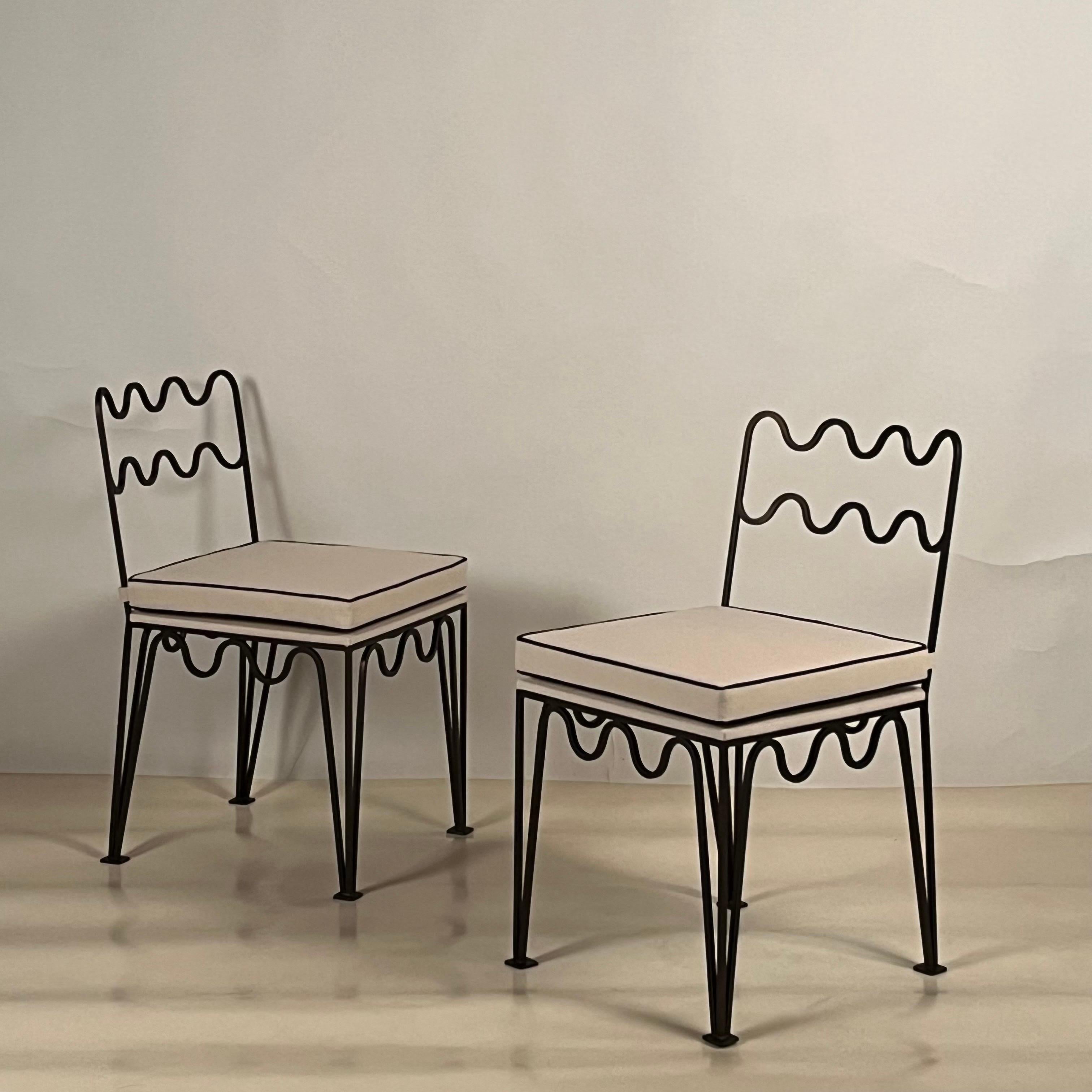 Pair of 'Méandre' dark bronze chairs by Design Frères. Chic and understated.