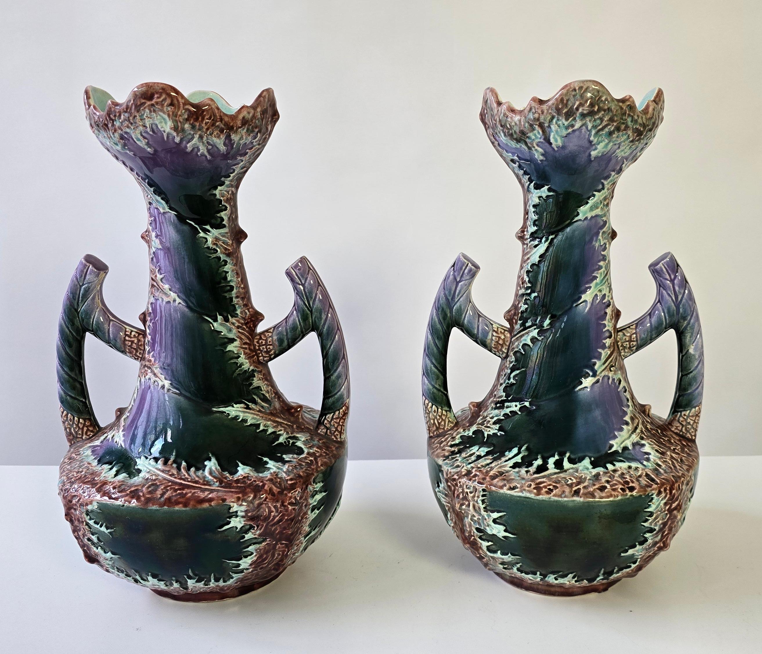Pair of Unique Mid-Century Ceramic Vases – Fat Lava Style with Art Nouveau/Art Deco Influences

A stunning and rare pair of mid-20th-century ceramic vases, reminiscent of the iconic Fat Lava style. These vases feature a bold, expressive glaze with