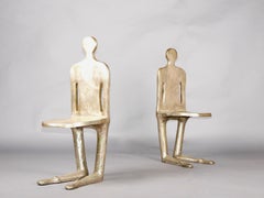 pair of unique in silvered bronze chairs representing a man and a woman