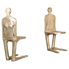 pair of unique in silvered bronze chairs representing a man and a woman