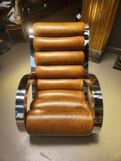 Pareja de sillones únicos de cuero y cromo modernos de mediados de siglo