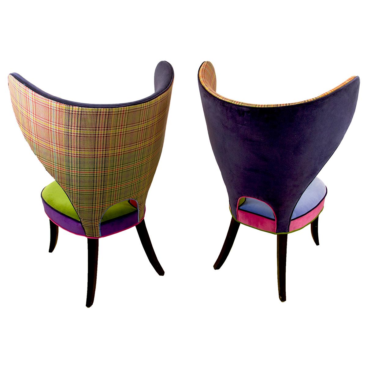 Pair of unique multi-fabric colorful upholstered modern wing chairs.