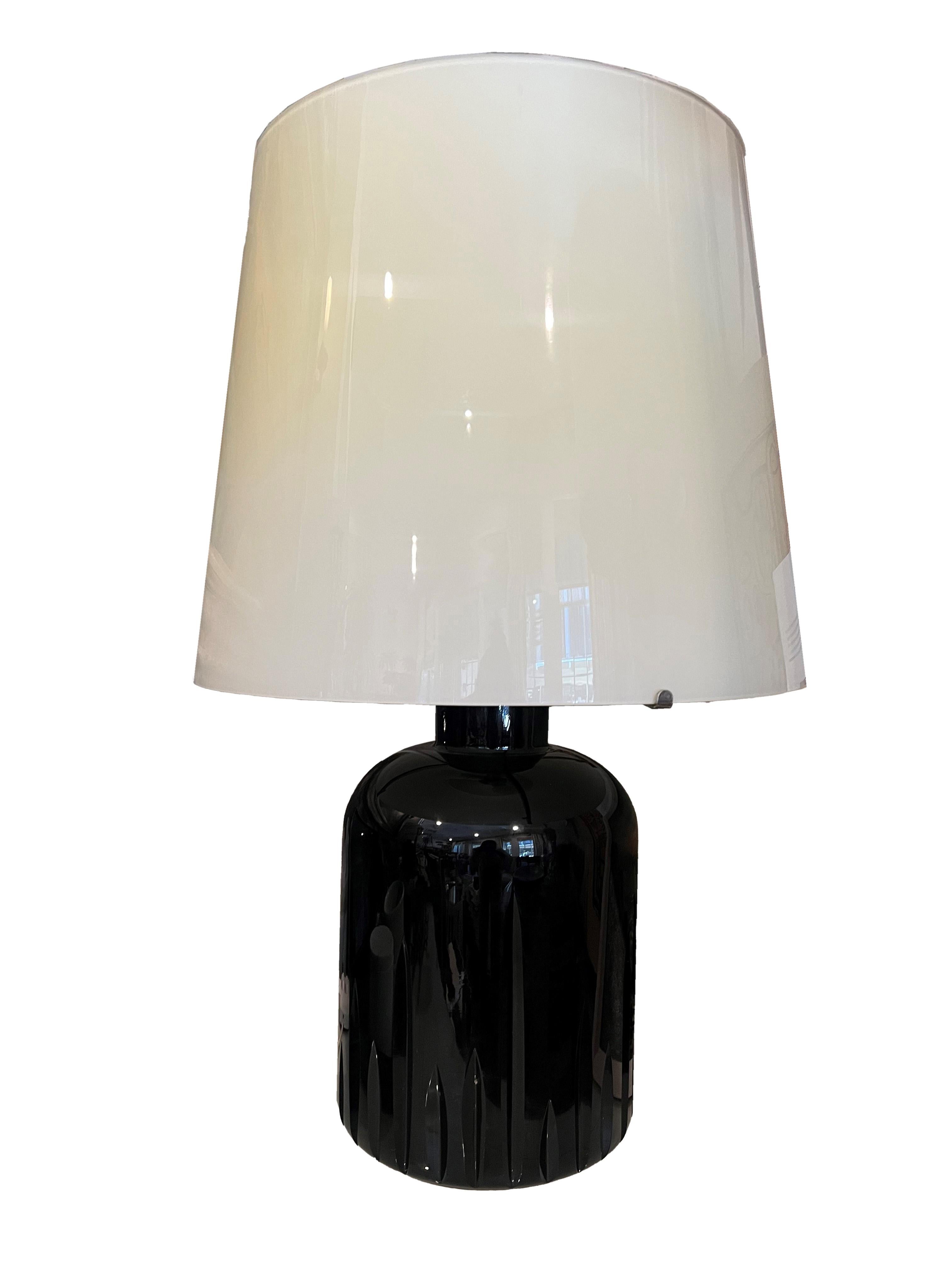 A rare and enchanting pair of Murano Glass table lamps, a unique treasure from the 1970s. These one-of-a-kind lamps were specially designed and crafted for a luxury ski resort in Switzerland, embodying the unparalleled elegance and artistry of that