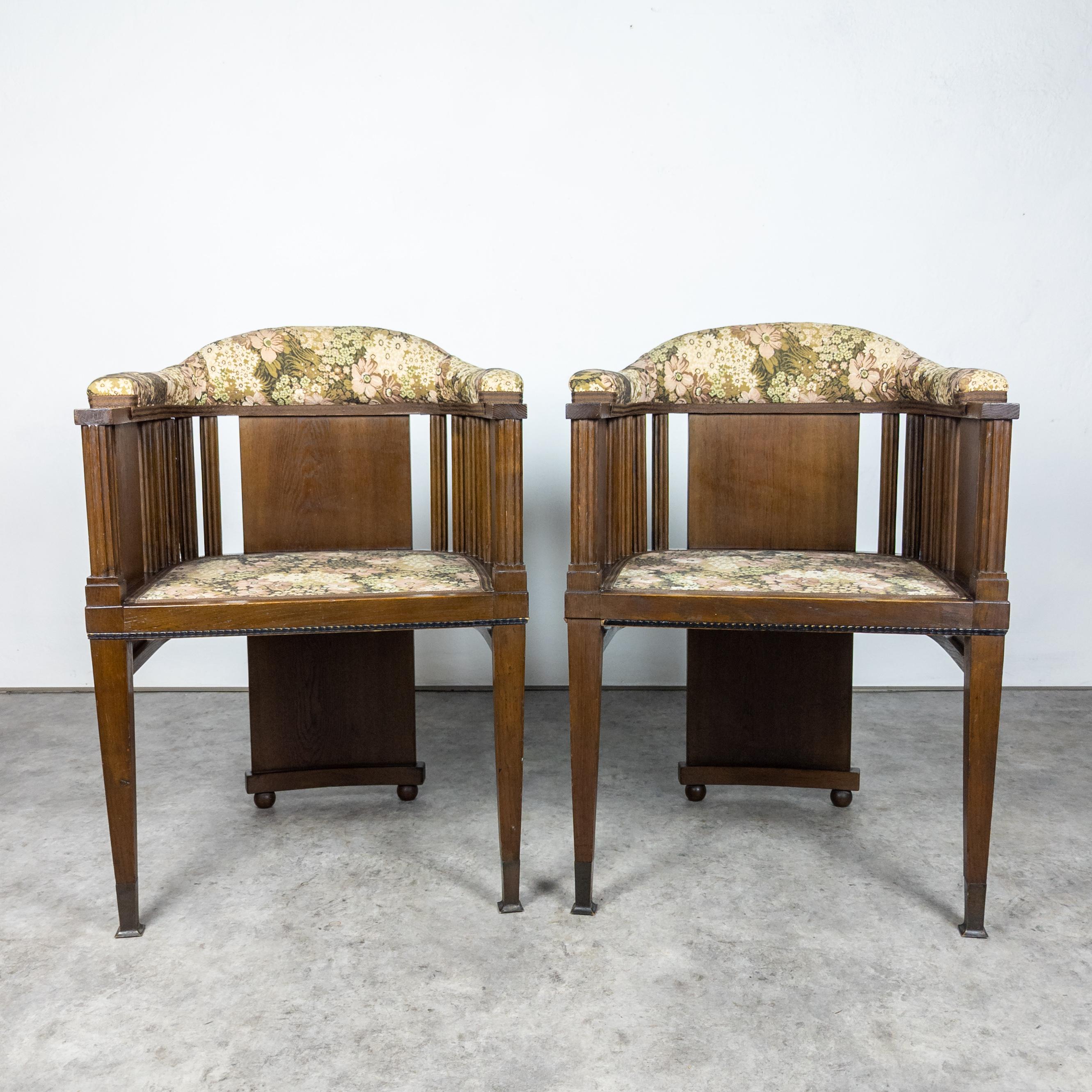 Pair of beautiful wooden carved armchairs in the manner of Viennese Modernism. This particular unique pieces were manufactured for the embassy of then Romanian kingdom in Prague, Czechoslovakia in baroque Morzinsky Palace (built by Jan Santini