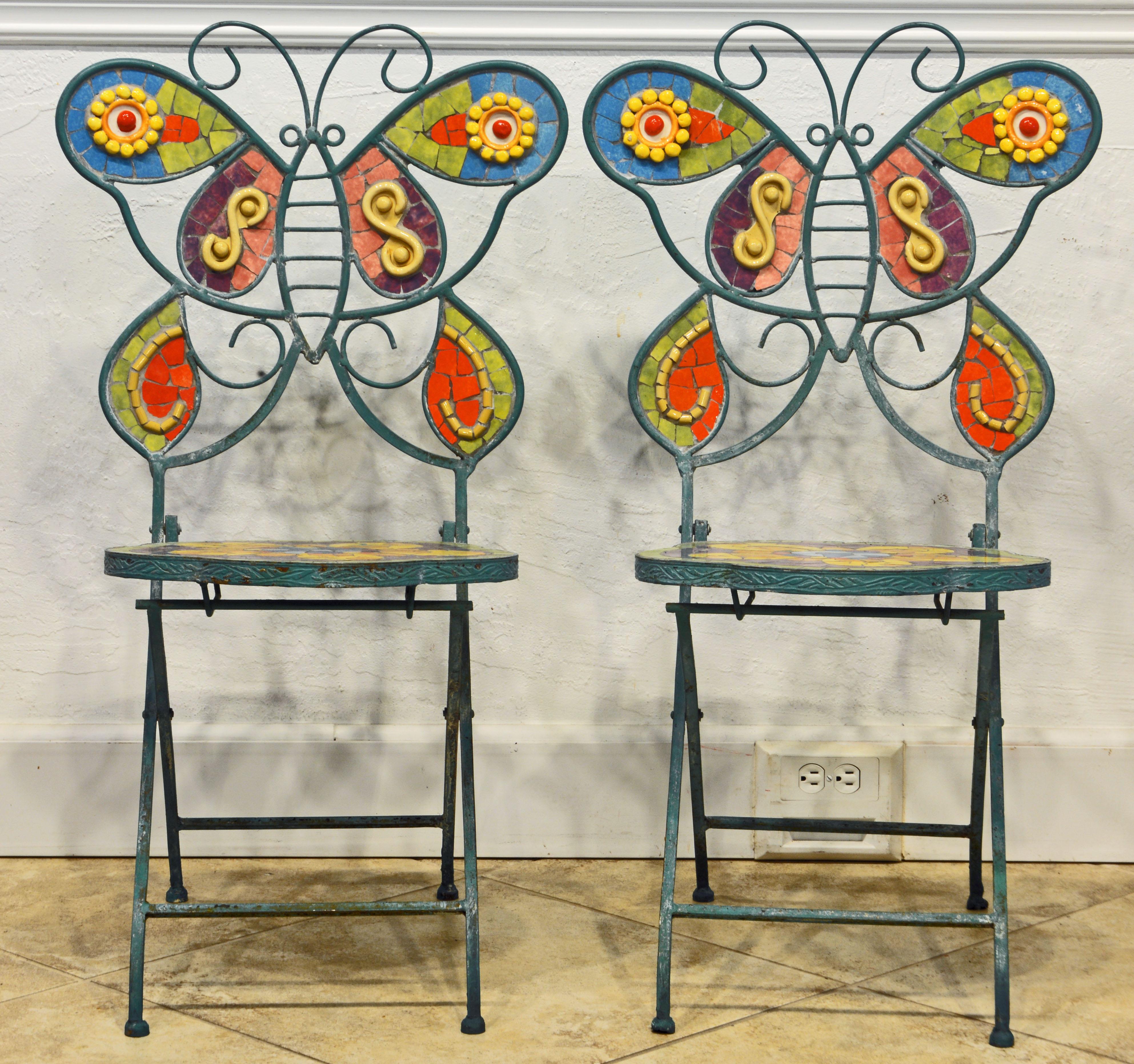 These uniquely artful butterfly chairs with inlaid colorful ceramic mosaic on seats and backs have been used outdoors but could also add the right touch to certain indoor settings. They date to the mid-20th century and the paint shows some rusty