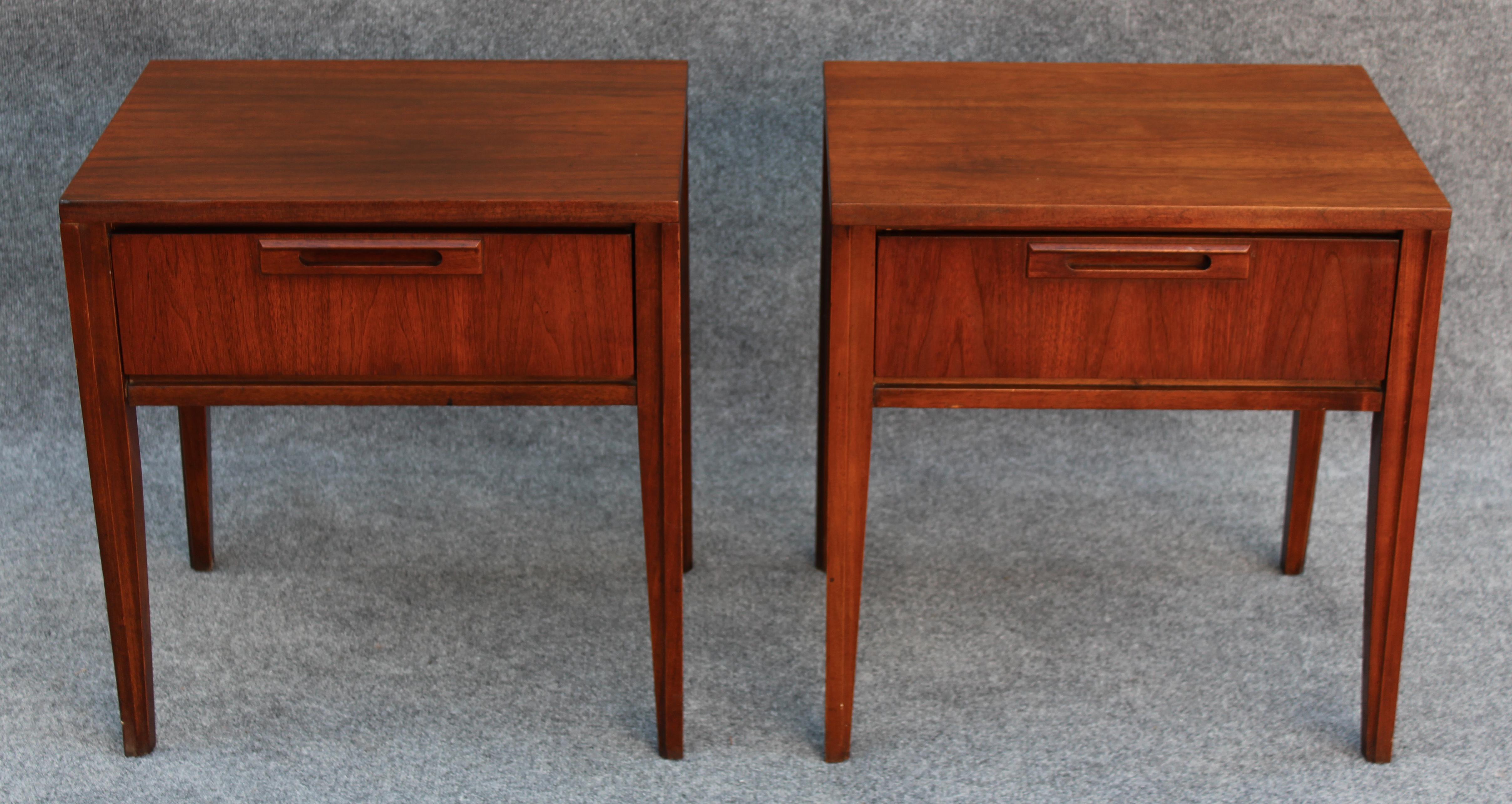 This pair of nightstands was made by United Furniture, manufacturers of the very successful Diamond Front line, and cover all the bases required for a great pair of nightstands. Featuring a simple design, each leg tapers elegantly towards the bottom